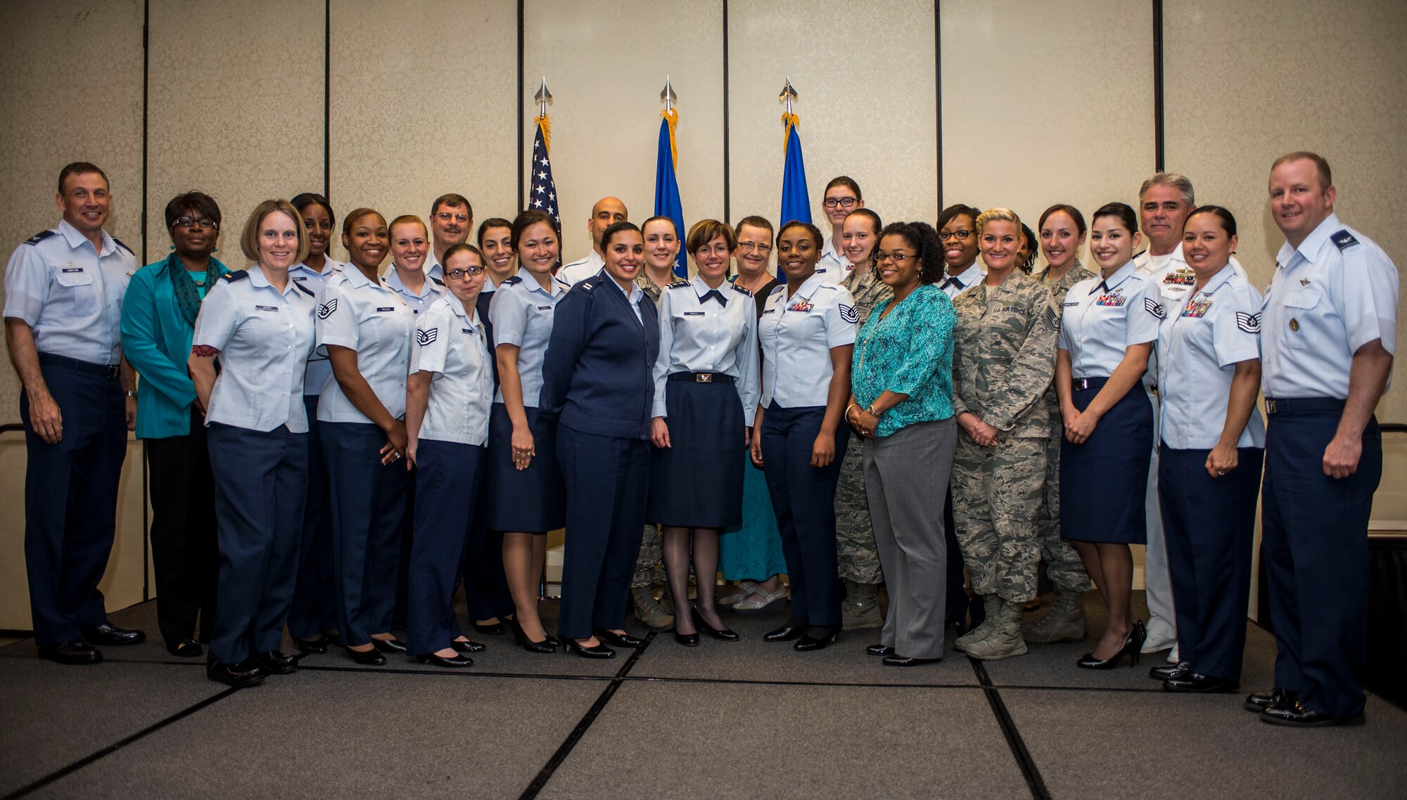 Maj. Gen. Gina Grosso, U.S. Air Force Sexual Assault Prevention and Response director, poses with Team Charleston leadership and victim advocates after a victim advocate recognition luncheon April 21, 2015, at Joint Base Charleston, S.C. The victim advocate program is spearheaded by the Sexual Assault Prevention and Response Office to ensure a compassionate and effective response for victims of sexual assault. (U.S. Air Force photo by Senior Airman Marianique Santos)
