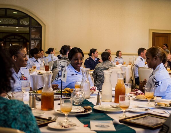 Team Charleston victim advocates interact with each other during a victim advocate recognition luncheon April 21, 2015, at Joint Base Charleston, S.C. The victim advocate program is spearheaded by the Sexual Assault Prevention and Response Office to ensure a compassionate and effective response for victims of sexual assault. (U.S. Air Force photo by Senior Airman Marianique Santos)