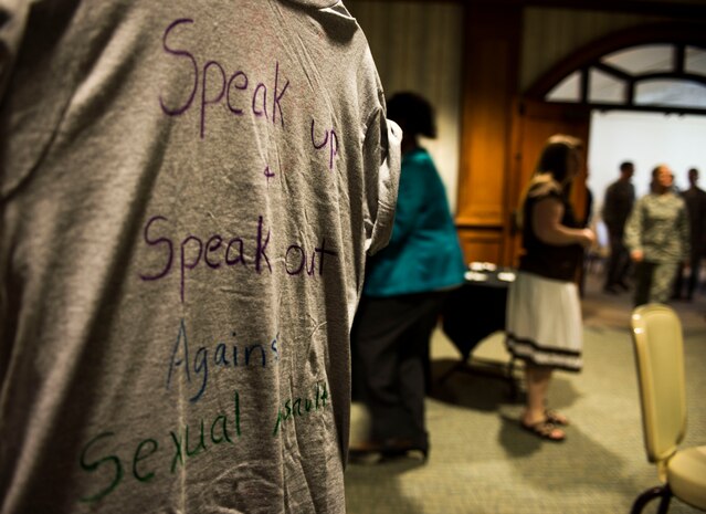 Military and civilian personnel attend a victim advocate recognition luncheon April 21, 2015, at Joint Base Charleston, S.C. The victim advocate program is spearheaded by the Sexual Assault Prevention and Response Office to ensure a compassionate and effective response for victims of sexual assault. (U.S. Air Force photo by Senior Airman Marianique Santos)