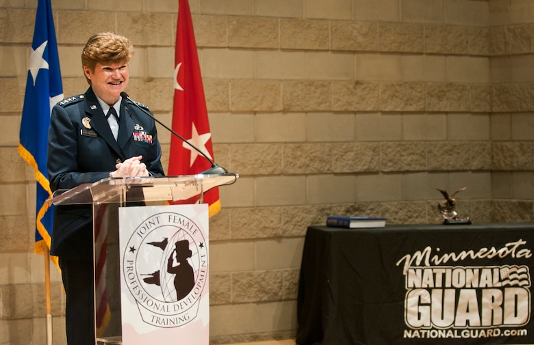 U.S Air Force Gen. Janet Wolfenbarger, Commander of the Air Force Material Command, speaks at the first annual Joint Female Professional Development Training Symposium in St. Paul, Minn., April 18, 2015. The symposium focused on personal and professional development of female airmen and soldiers in the military. The symposium topics included resiliency and retention, exposure to extraordinary female leadership, and also included activities that supported inclusion and diversification of thought and talent.
 (Minnesota National Guard photo by Staff Sgt. Austen Adriaens/ Released)
