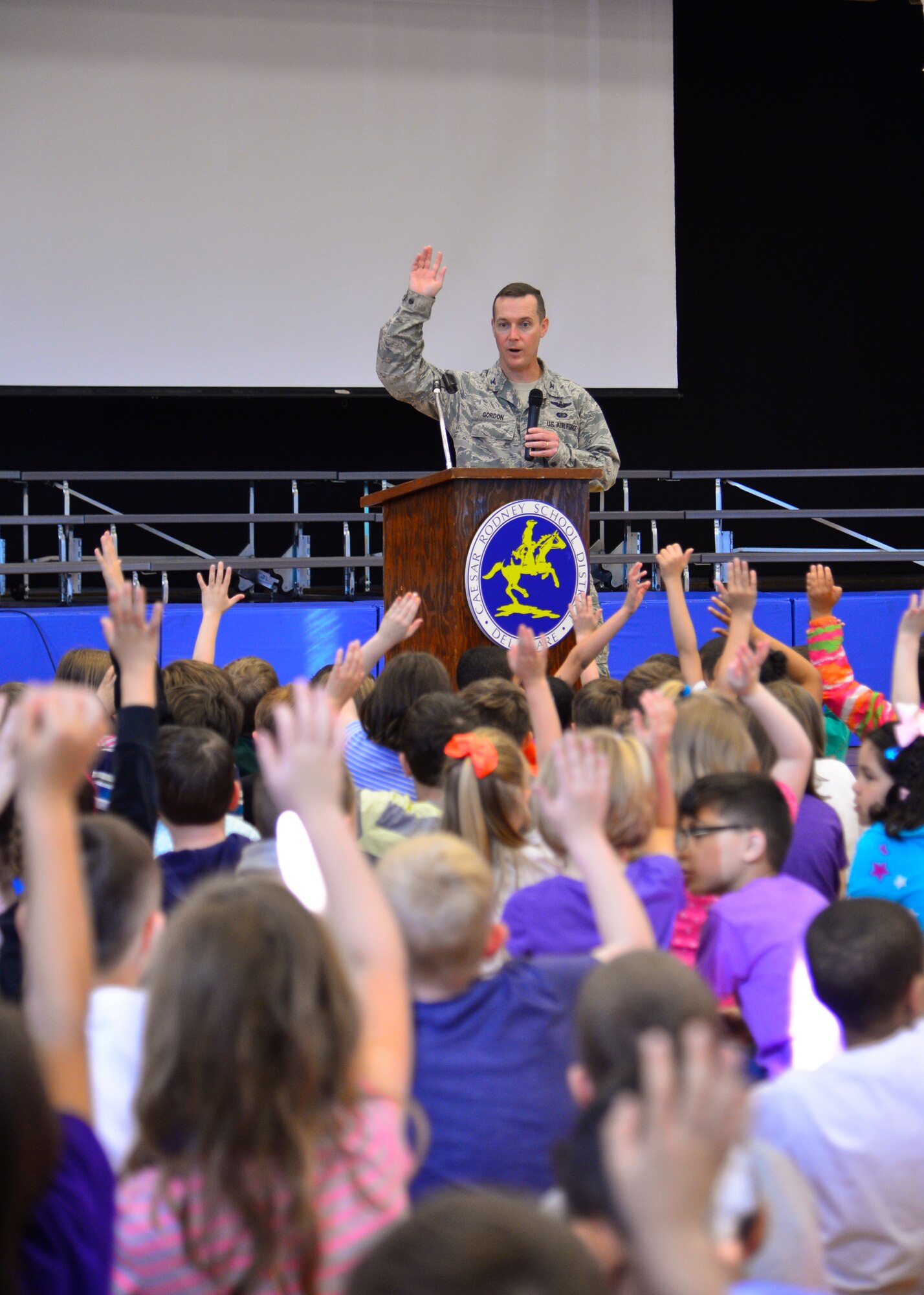 Col. Kevin Gordon, 436th Airlift Wing vice commander, speaks to children of Welch Elementary school during the Welch’s Month of the Military Child assembly April 21, 2015, at Welch Elementary School on Dover Air Force Base, Del. Gordon was invited to be the guest speaker of the assembly. (U.S. Air Force photo/Airman 1st Class William Johnson)