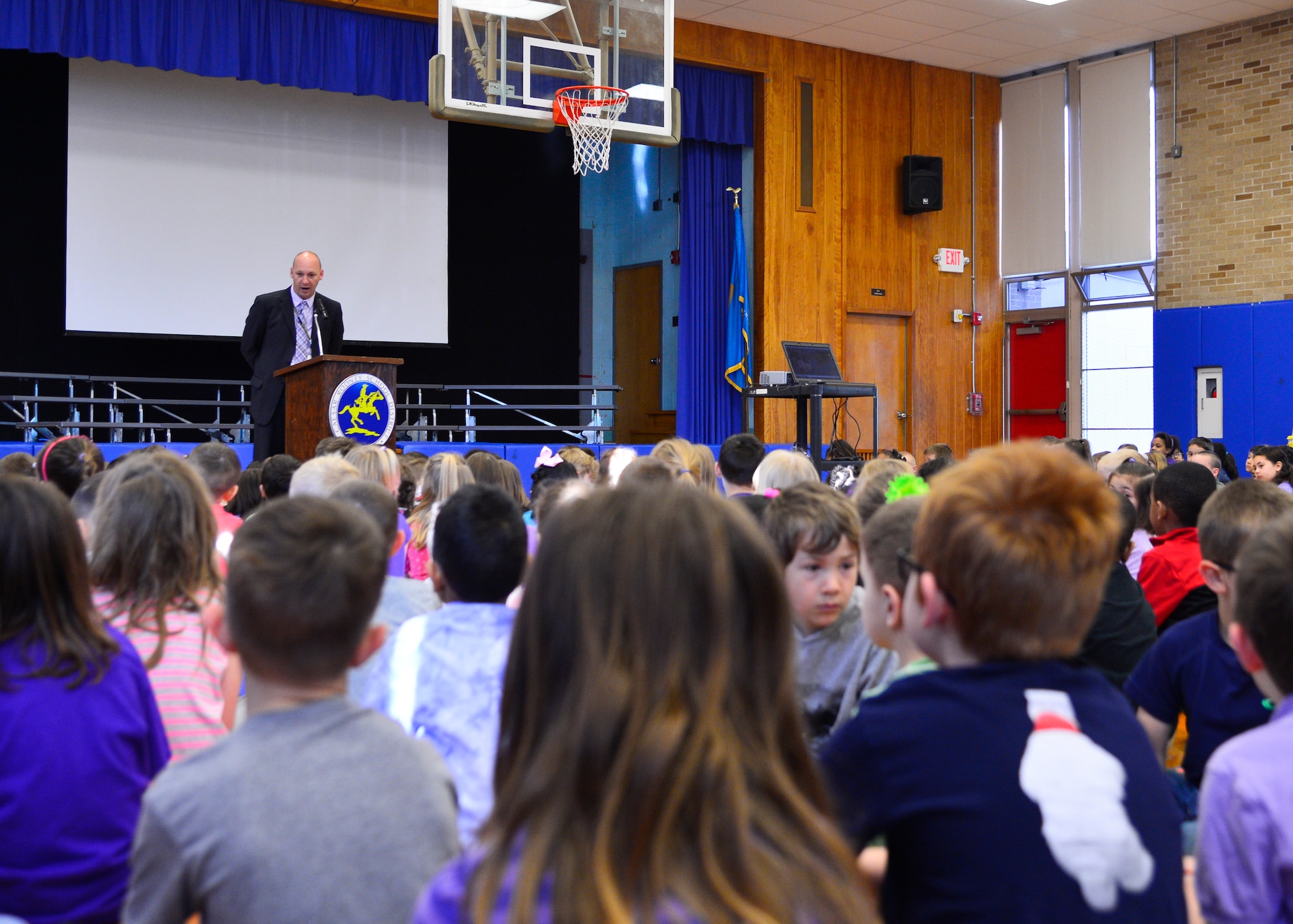 Jason Payne, Welch Elementary School principal, speaks to students at the Welch’s Month of the Military Child assembly April 21, 2015, at Welch Elementary School on Dover Air Force Base, Del. April is Month of the Military Child and Welch Elementary School held an assembly to recognize all the sacrifices of military children. (U.S. Air Force photo/Airman 1st Class William Johnson)