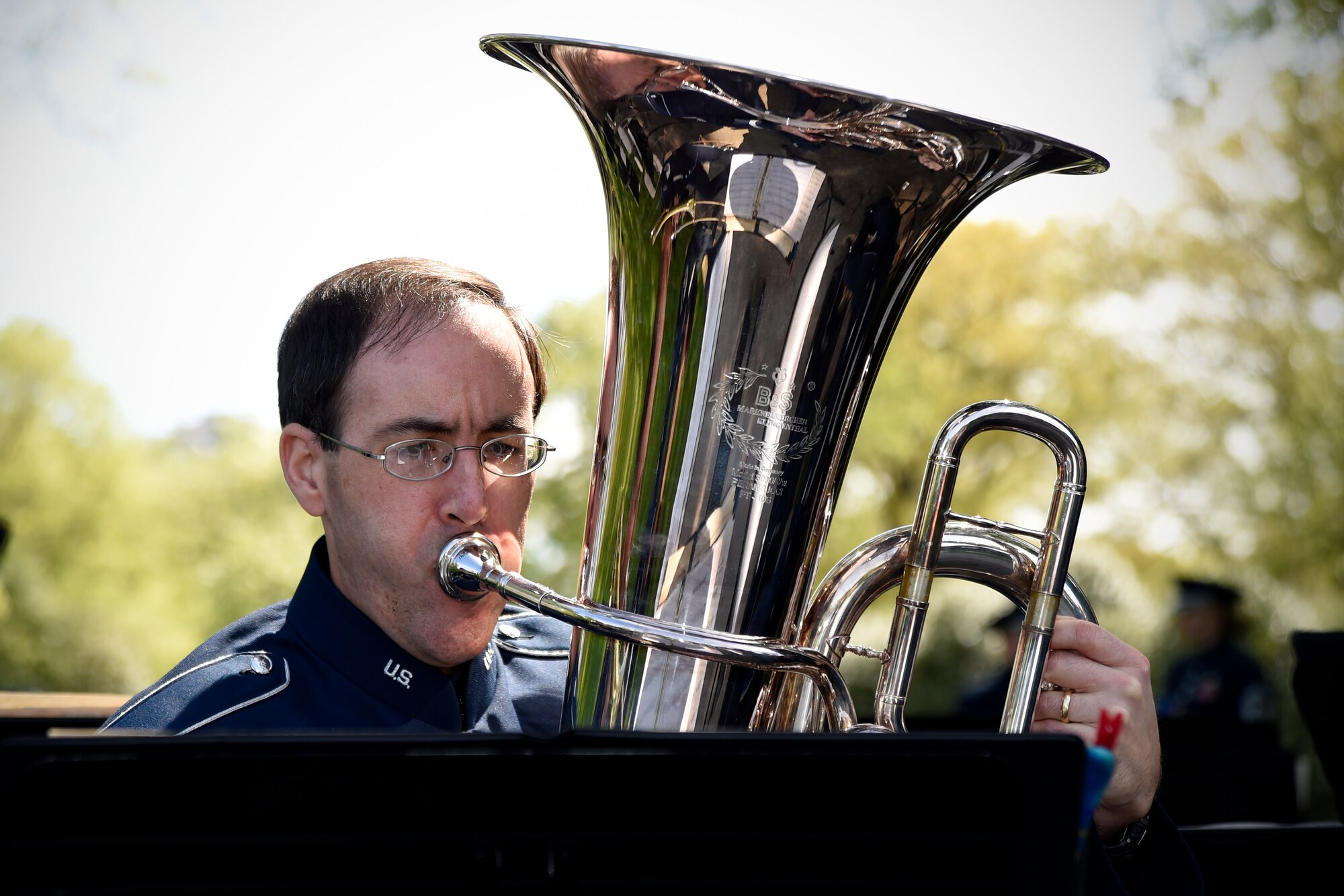 Senior Master Sgt. Brian Sands, U.S. Air Force Concert Band tubist, performs during a White House Garden Tour Concert in Washington, D.C., April 26, 2015. Two weekends a year, visitors can listen to music while viewing the South Lawn and the gardens of the White House. (U.S. Air Force photo/Airman 1st Class Ryan J. Sonnier)