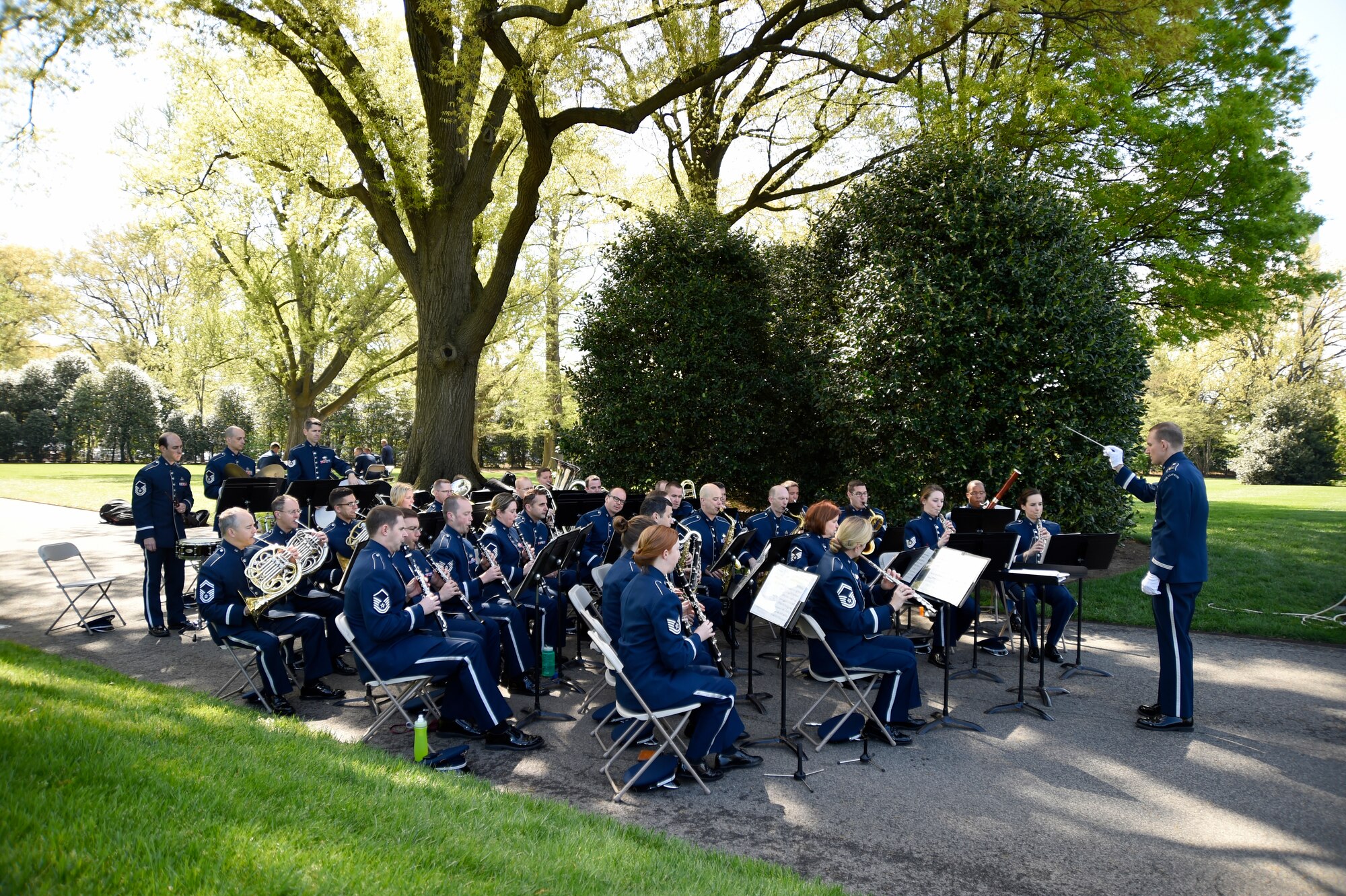 The U.S Air Force Concert Band prepares for a White House Garden Tour Concert in Washington, D.C., April 26, 2015. Two weekends a year, visitors can listen to music while viewing the South Lawn and the gardens of the White House. (U.S. Air Force photo/Airman 1st Class Ryan J. Sonnier)