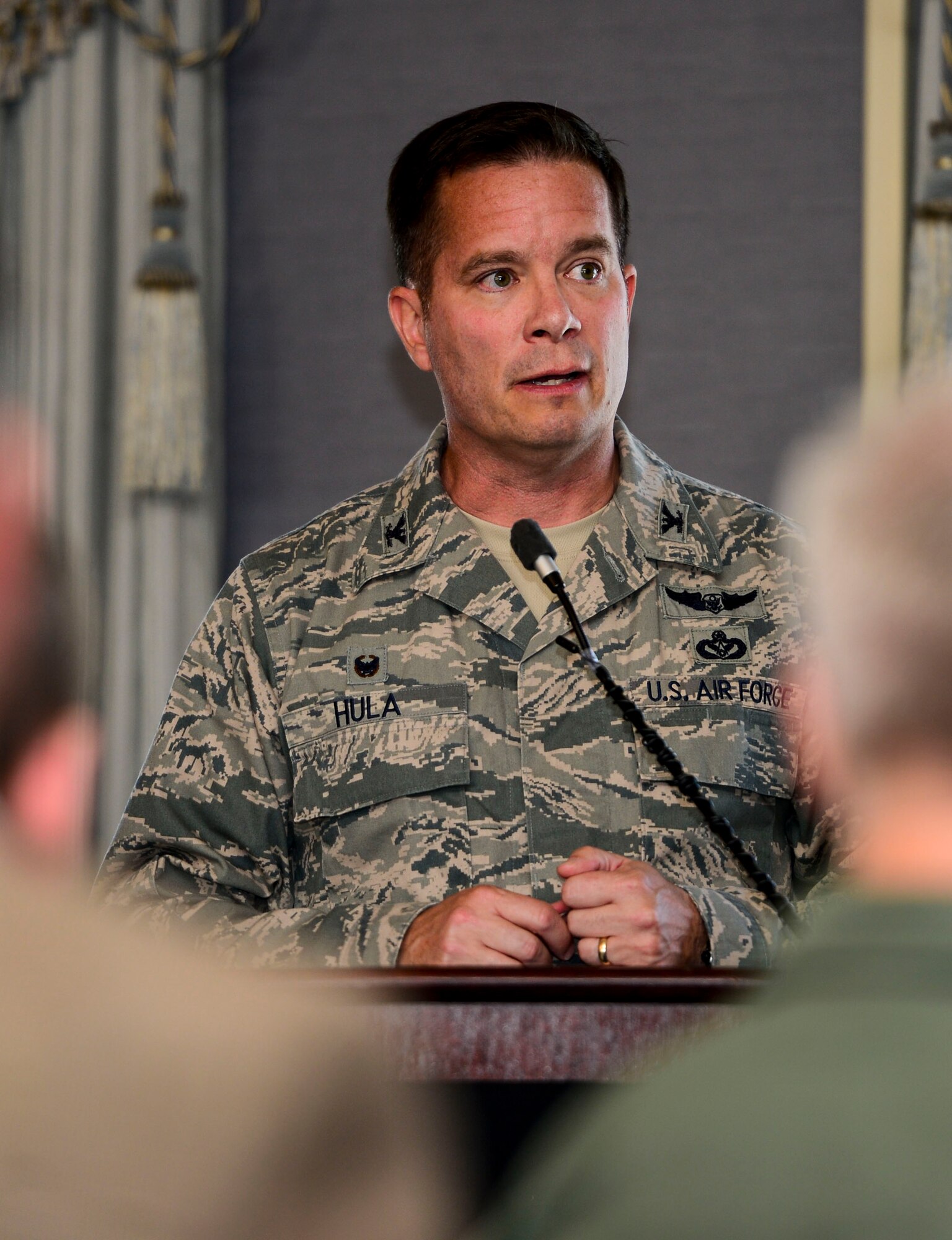U.S. Air Force Col. Russell Hula, Air Force Installation and Mission Support Center Detachment 8 commander, gives remarks during his assumption of command ceremony at Joint Base Langley-Eustis, Va., April 24, 2015. Hula is responsible for managing AFIMSC’s assets to support Air Combat Command’s commanders and missions, which currently span 14 bases and more than 50 operating locations worldwide. (U.S. Air Force photo by Senior Airman Kayla Newman/Released)