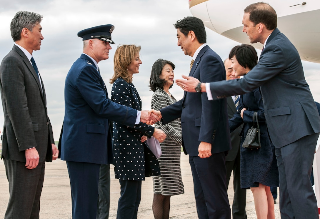 Col. Lawrence Havird, 89th Maintenance Group commander, greets Shinzō Abe, Japanese Prime Minister, at Joint Base Andrews, Md., April 27, 2015. Abe is in the U.S. for a week-long visit to promote stronger military and economic ties. (U.S. Air Force photo by Senior Master Sgt. Kevin Wallace/RELEASED)