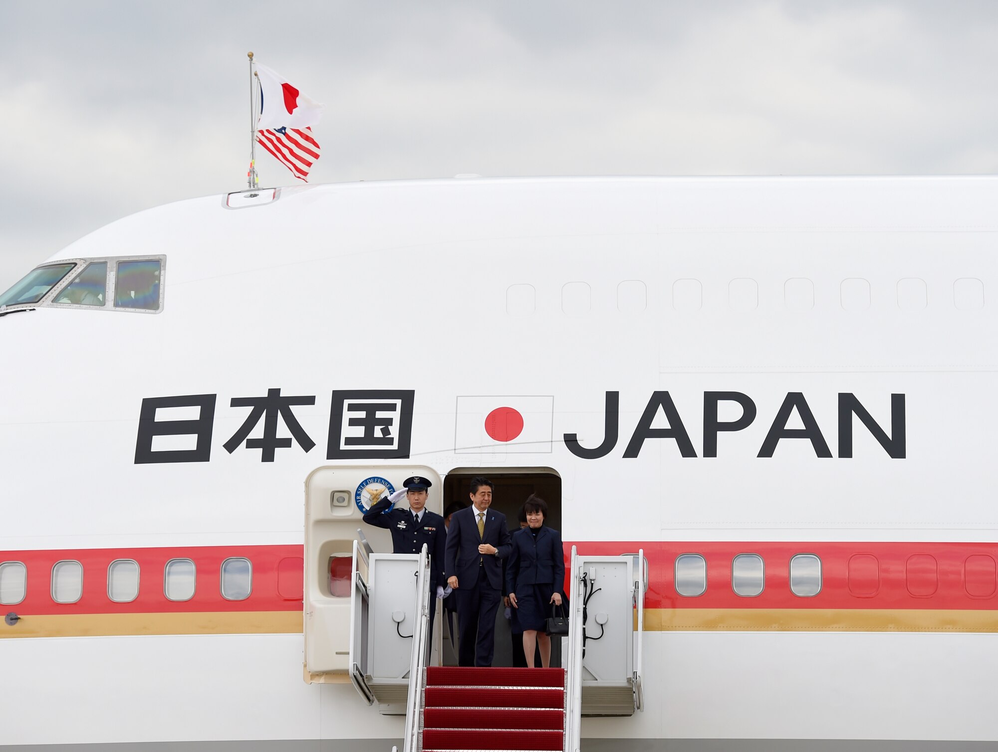 Shinzō Abe, Japanese Prime Minister, and his wife, Akie Abe, arrive at Joint Base Andrews, Md., April 27, 2015. Abe is visiting the U.S. meet with government officials about a new phase in U.S.-Japan relations. (U.S. Air Force photo/Airman 1st Class Ryan J. Sonnier)