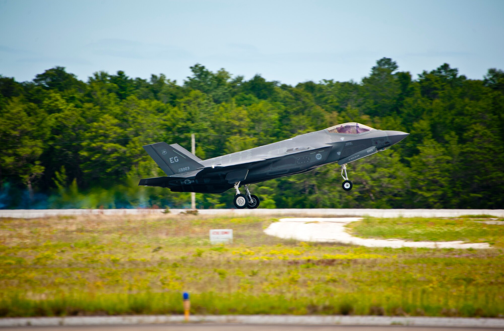 Royal Australian Air Force Squadron Leader Andrew Jackson, F-35 Lightning II student pilot, completes his final training mission after landing on Eglin Air Force Base, Fla., April 23, 2015. Jackson made history as the first Australian pilot to fly in the F-35A. The fifth-generation aircraft will meet Australia’s future air combat and strike needs, providing a networked force-multiplier effect in terms of situational awareness and combat effectiveness. (U.S. Air Force photo/Staff Sgt. Marleah Robertson)