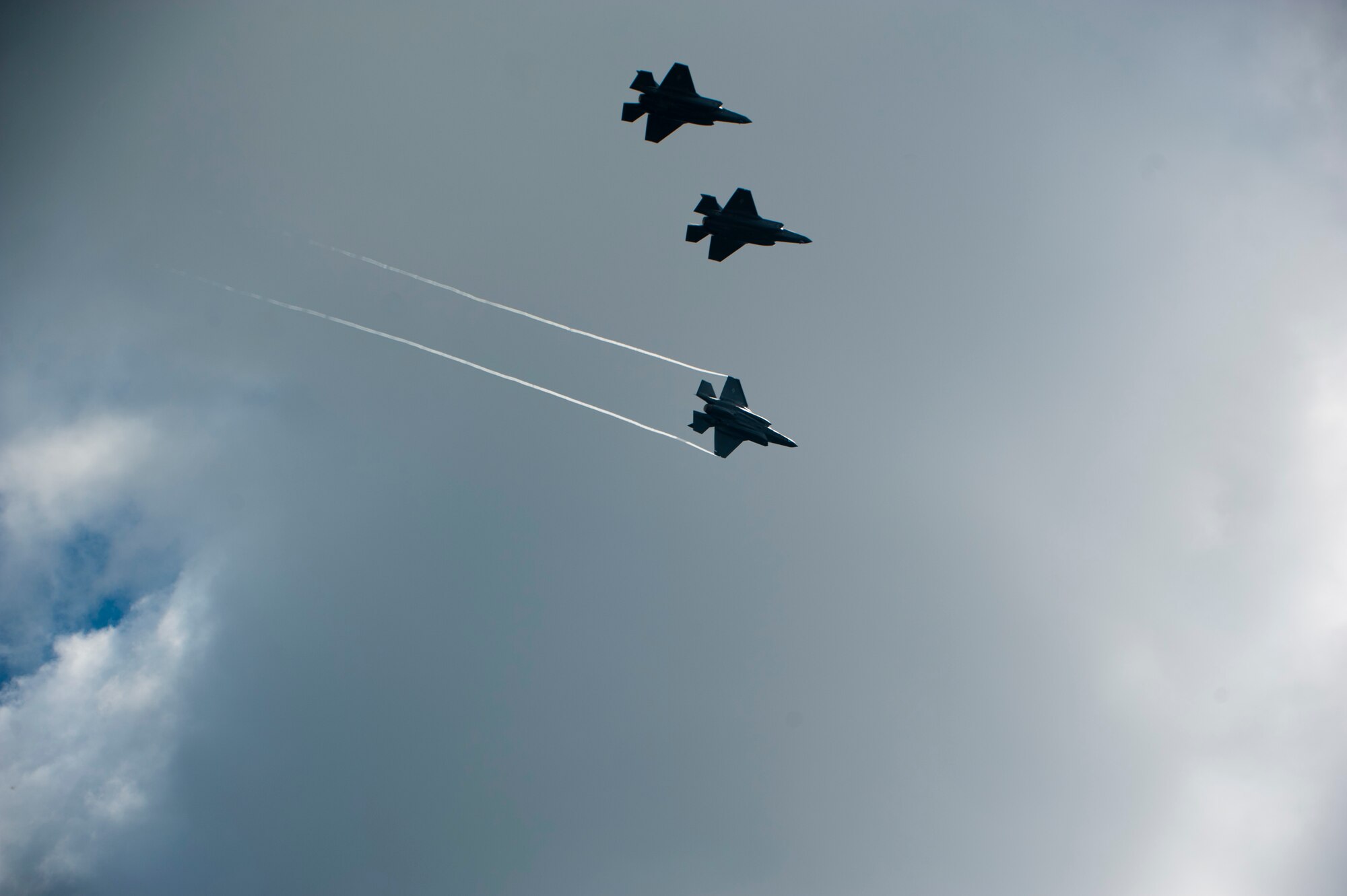 Four F-35A Lightning IIs prepare to land after a training mission over Eglin Air Force Base, Fla., April 23, 2015. Royal Australian Air Force Squadron Leader Andrew Jackson made history as the first Australian pilot to fly in the F-35A. The fifth-generation aircraft will meet Australia’s future air combat and strike needs, providing a networked force-multiplier effect in terms of situational awareness and combat effectiveness. (U.S. Air Force photo/Staff Sgt. Marleah Robertson)