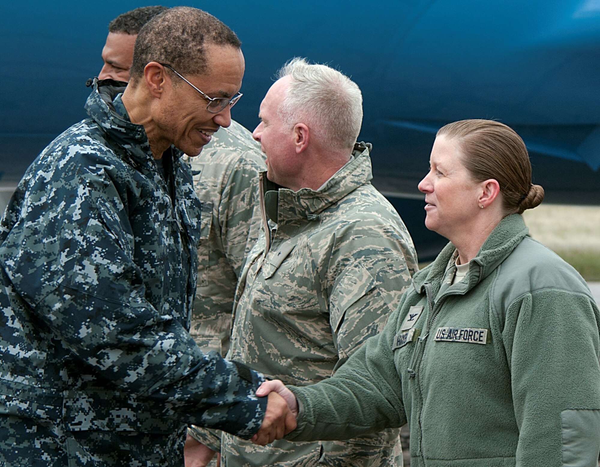 U.S. Navy Adm. Cecil D. Haney, U.S. Strategic Command commander, is greeted by Col. Tracey Hayes, 90th Missile Wing commander, during a visit to F.E. Warren Air Force Base, Wyo., April 27, 2015. Haney travelled to F.E. Warren to chair the Intercontinental Ballistic Missile Stakeholders meeting, one of several such meetings that will be held this year. These forums are designed to assess the health and direction of the nation's strategic forces, including bomber, ICBM and submarine forces, as well as the communication networks and sensors that tie them all together. USSTRATCOM is one of nine DoD unified combatant commands and is charged with strategic deterrence; space operations; cyberspace operations; joint electronic warfare; global strike; mission defense; intelligence, surveillance and reconnaissance; combat weapons of mass destruction; and analysis and targeting. (U.S. Air Force photo by Airman 1st Class Brandon Valle)
