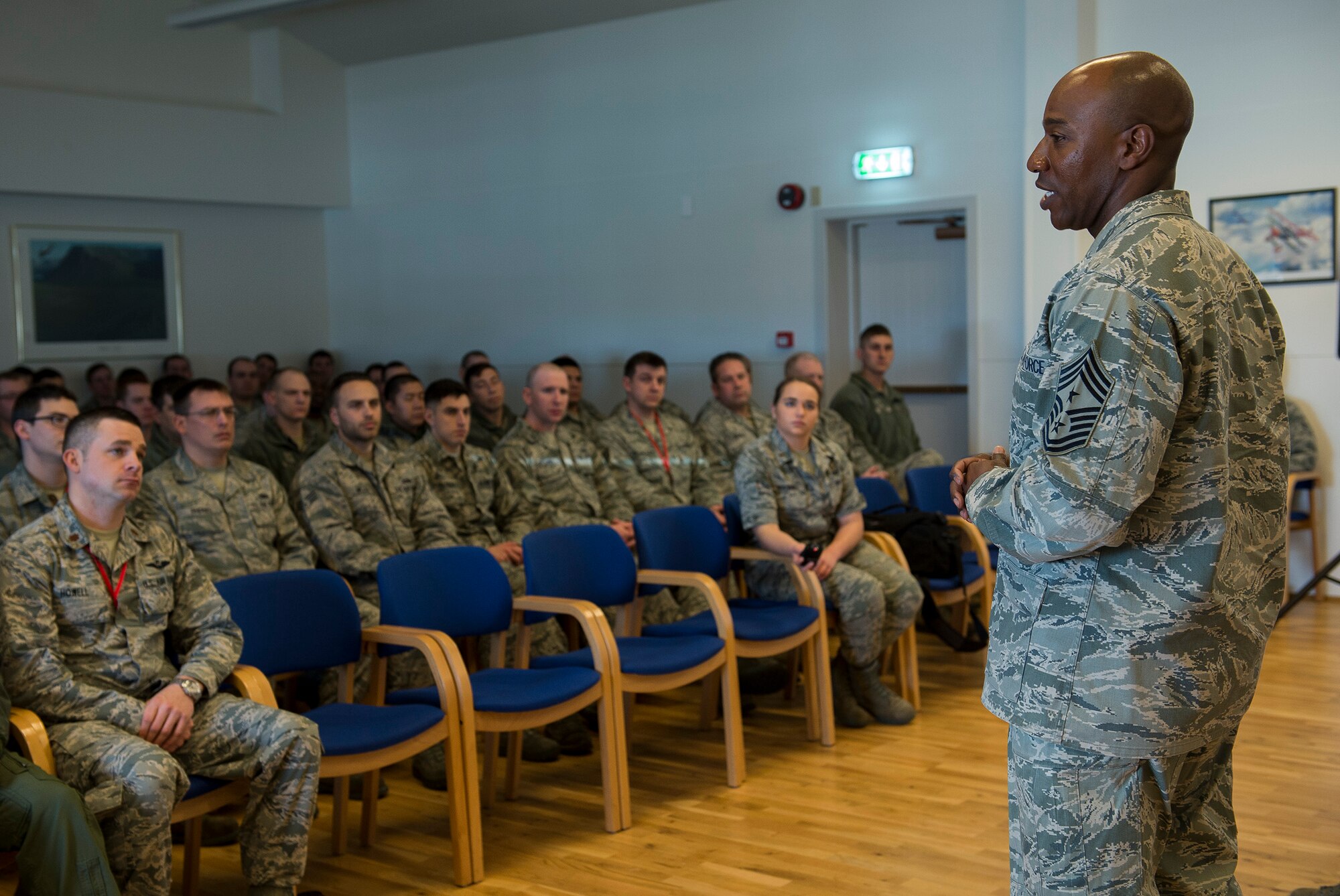 U.S. Air Force Chief Master Sgt. Kaleth Wright, 3rd Air Force command chief, addresses members of the 871st Air Expeditionary Squadron at the Icelandic Air Surveillance and Policing conference center in Keflavik, Iceland, April 23, 2015. Wright and U.S. Air Force Lt. Gen. Darryl Roberson, 3rd AF commander, toured the facilities and spoke with Airmen regarding the IAS mission, an ongoing NATO commitment to maintain the security of Iceland’s airspace.(U.S. Air Force photo by Staff Sgt. Chad Warren/Released)