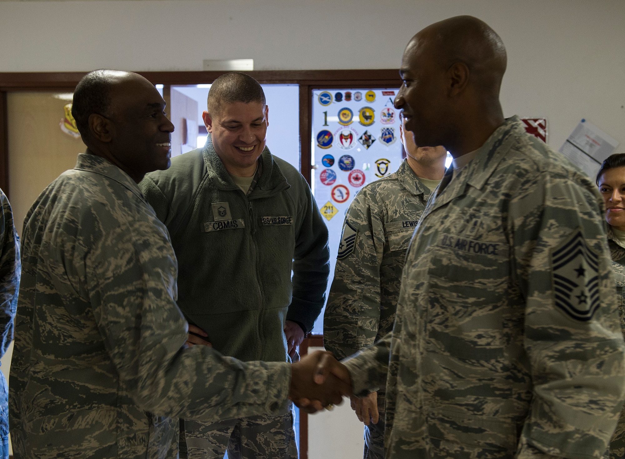 U.S. Air Force Chief Master Sgt. Kaleth Wright, 3rd Air Force command chief, greets U.S. Air Force Capt. Sean Ballard, 871st Air Expeditionary Squadron chaplain, at the Icelandic Air Surveillance and Policing maintenance center in Keflavik, Iceland, April 23, 2015. Wright and U.S. Air Force Lt. Gen. Darryl Roberson, 3rd AF commander, toured the facilities and spoke with Airmen regarding the IAS mission, an ongoing NATO commitment to maintain the security of Iceland’s airspace. (U.S. Air Force photo by Staff Sgt. Chad Warren/Released)