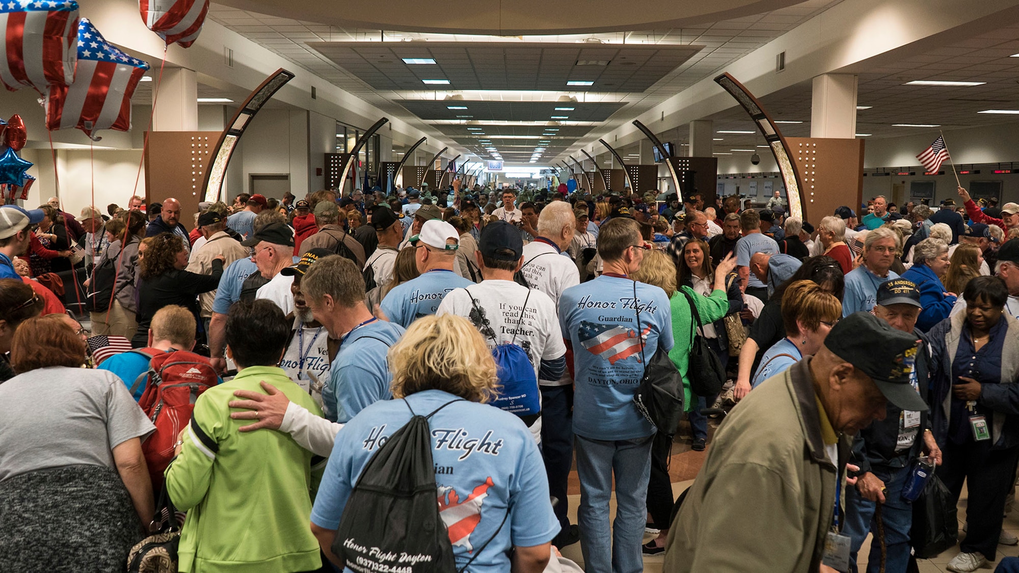 DAYTON, OHIO – Members of the 445th Airlift Wing join other military and local community members at the Dayton International Airport, April 11, 2015 as they salute U.S. military veterans returning from Washington, D.C. More than 800 people were on hand to welcome the vets. The veterans participated in the Honor Flight program which includes a paid trip to Washington, D.C., a visit to each war memorial, and a return flight home.  (U.S. Air Force photo/Senior Airman Devin Long)