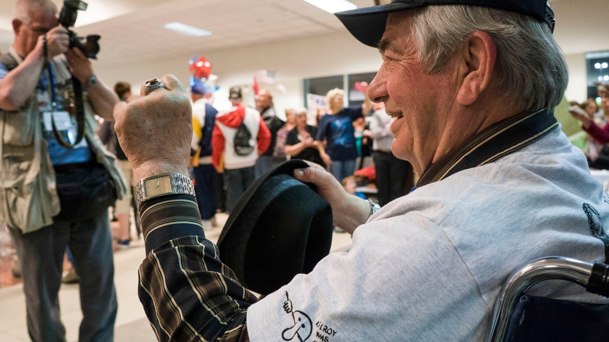 DAYTON, OHIO – Members of the 445th Airlift Wing join other military and local community members at the Dayton International Airport, April 11, 2015 as they salute U.S. military veterans returning from Washington, D.C. More than 800 people were on hand to welcome the vets. The veterans participated in the Honor Flight program which includes a paid trip to Washington, D.C., a visit to each war memorial, and a return flight home.  (U.S. Air Force photo/Senior Airman Devin Long)