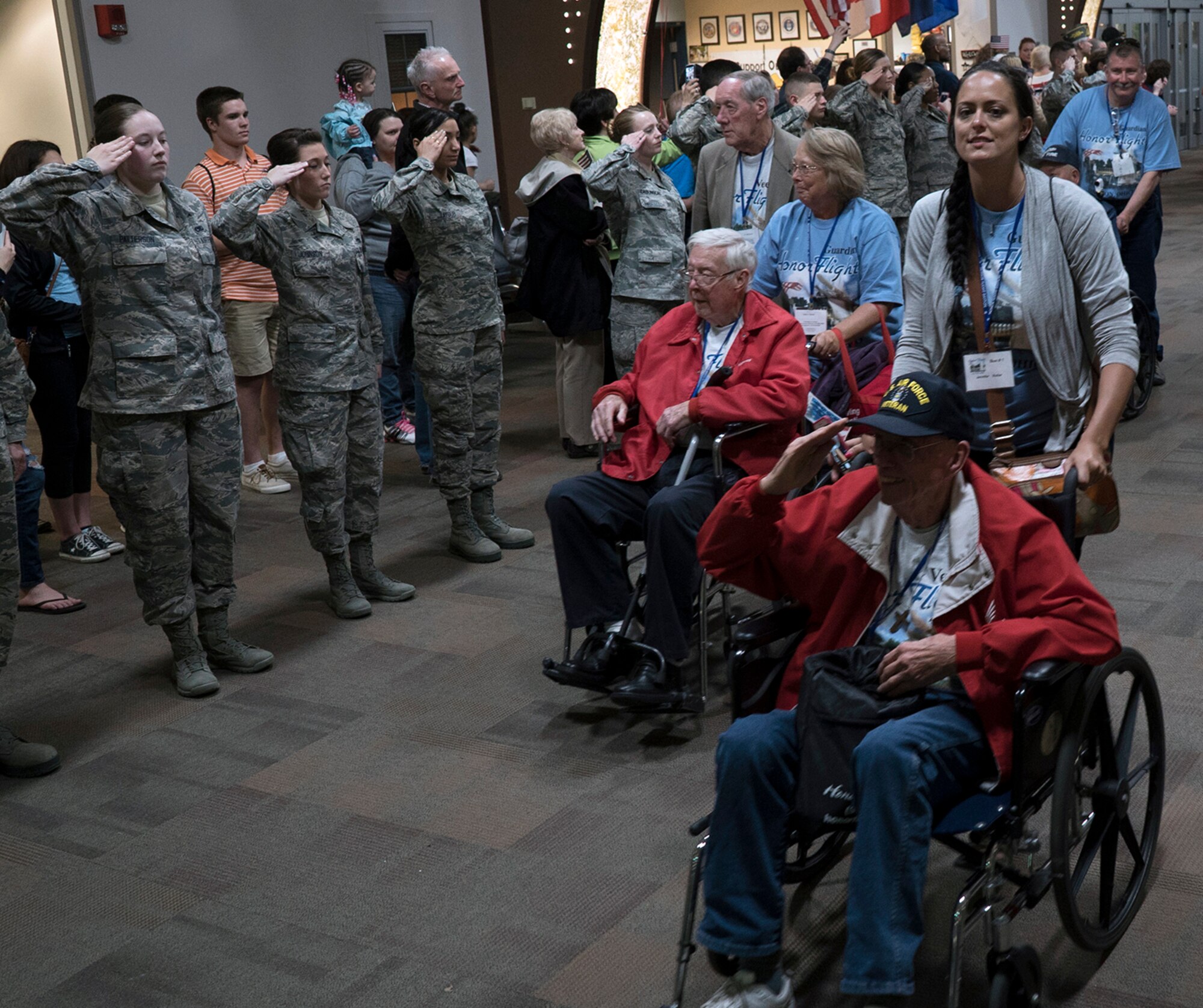 DAYTON, OHIO – Members of the 445th Airlift Wing join other military and local community members at the Dayton International Airport, April 11, 2015 as they salute U.S. military veterans returning from Washington, D.C. More than 800 people were on hand to welcome the vets. The veterans participated in the Honor Flight program which includes a paid trip to Washington, D.C., a visit to each war memorial, and a return flight home.  (U.S. Air Force photo/Senior Airman Devin Long)