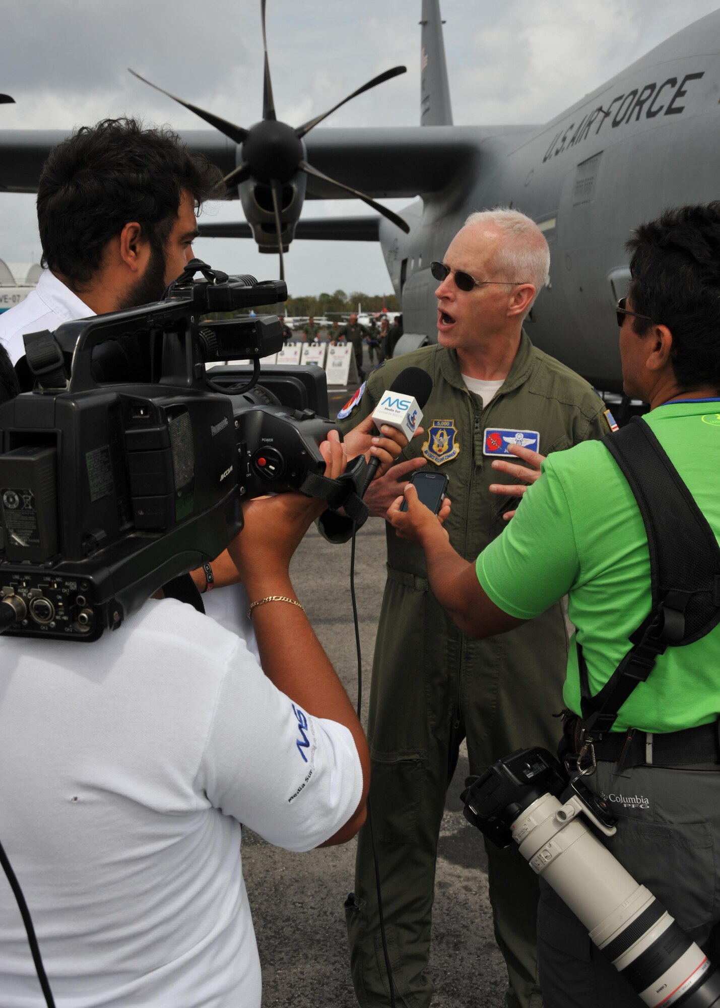 Mexican media interview Lt. Col. Jon Talbot, 53rd Weather Reconnaissance Squadron chief meteorologist, during the Caribbean Hurricane Awareness Tour at Cozumel, Mexico, April 21, 2015. The outreach program, which began in the 1970's and is a joint effort between National Oceanic and Atmospheric Administration's National Hurricane Center and the 403rd Wing's 53rd Weather Reconnaissance Squadron, promotes hurricane awareness and preparedness throughout the Caribbean region. (U.S. Air Force photo/Maj. Marnee A.C. Losurdo)
