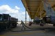 An Airman assigned to the 20th Logistics Readiness Squadron fuels management flight walks to a fuels truck after fueling an F-16CM Fighting Falcon at Shaw Air Force Base, S.C., April ,6 2015. The LRS fuels management flight airmen fuel the jets after each flight. (U.S. Air Force photo by Senior Airman Jensen Stidham/Released)