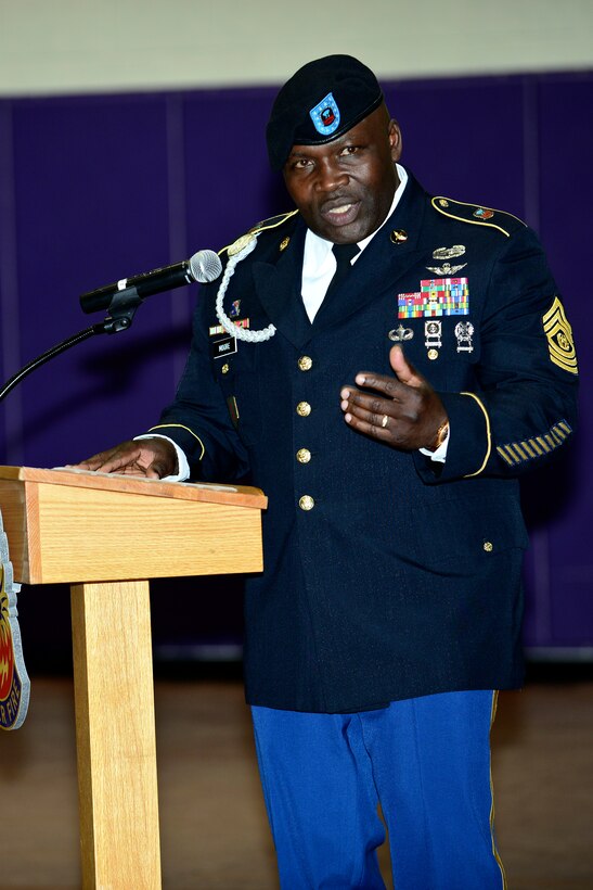 U.S. Army Sgt. Major John Moore, 128th Aviation Brigade outgoing command sergeant major, speaks during a change of responsibility ceremony at Fort Eustis, Va., April 27, 2015. In addition to relinquishing responsibility, Moore also retired from the Army after more than 30 years of service. (U.S. Air Force photo by Senior Airman Kimberly Nagle/Released)  