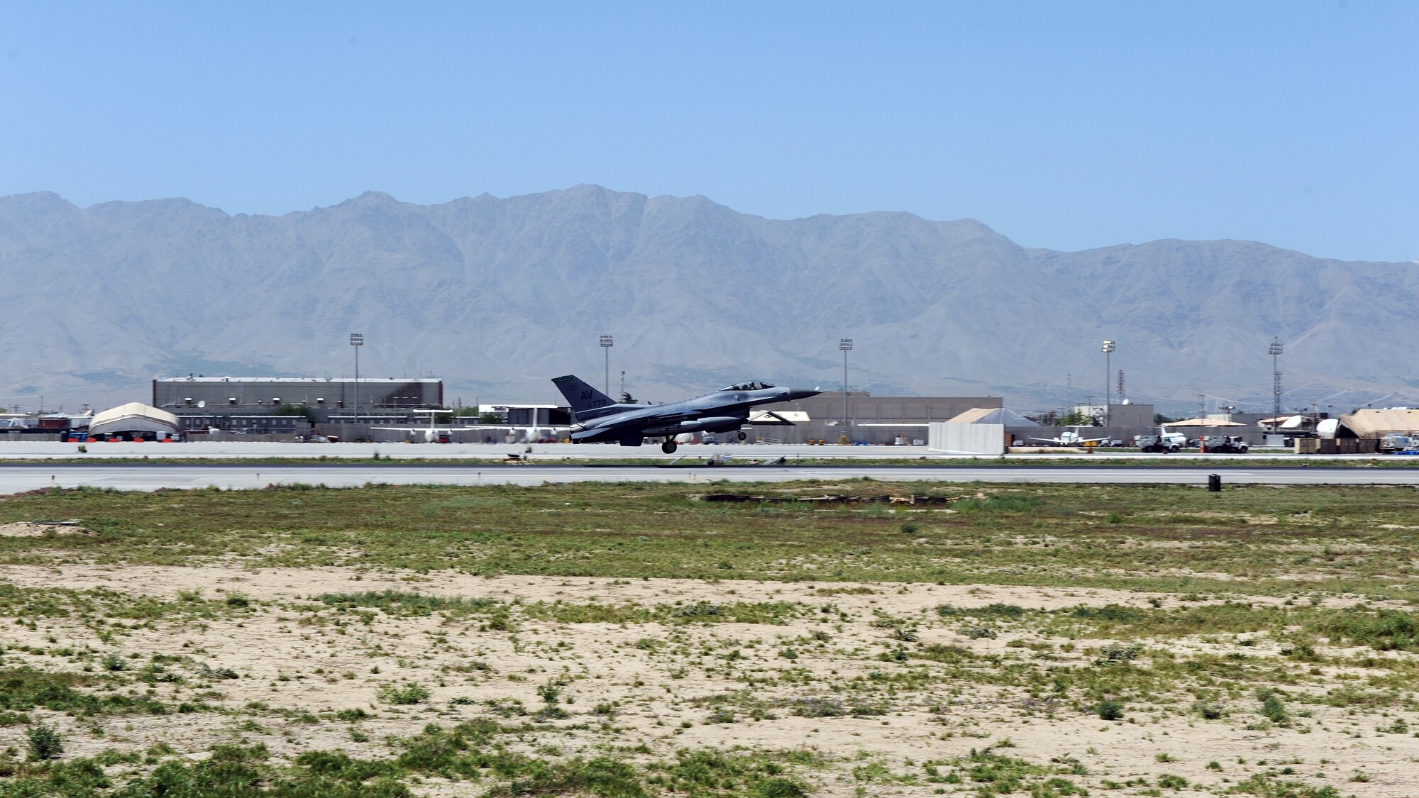 An F-16 Fighting Falcon “Triple Nickel” aircraft assigned to the 555th Fighter Squadron from Aviano Air Base, Italy, prepares to land on the flightline at Bagram Air Field, Afghanistan, April 27, 2015. Members of the Triple Nickel are deployed in support of Operations Freedom’s Sentinel and Resolute Support and are in theater to replace the 4th Fighter Squadron from Hill Air Force Base, Utah. (U.S. Air Force photo by Staff Sgt. Whitney Amstutz/Released)