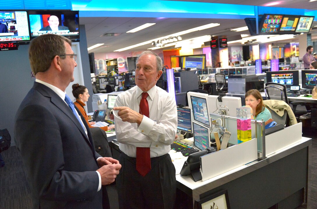Defense Secretary Ash Carter, left, meets with former New York City Mayor Michael Bloomberg in the newsroom of Bloomberg News while on a trip to New York City, April 27, 2015.