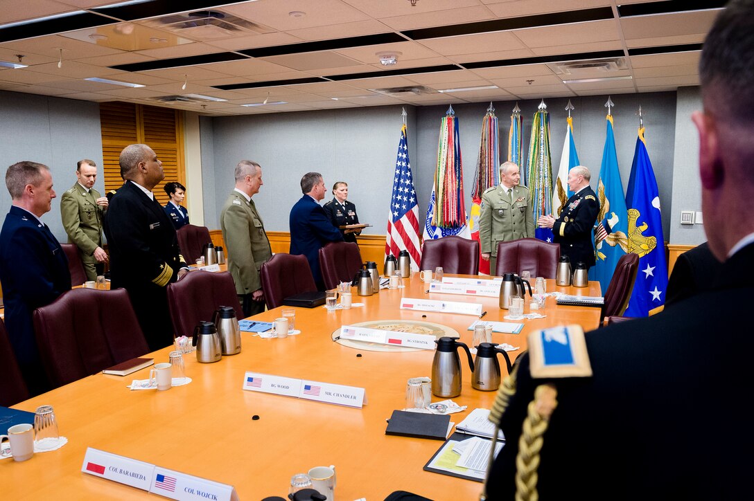 U.S. Army Gen. Martin E. Dempsey, right, chairman of the Joint Chiefs of Staff, welcomes Polish Army Gen. Mieczyslaw Gocul, chief of the general staff of Poland's armed forces, to the Pentagon April 28, 2015. 