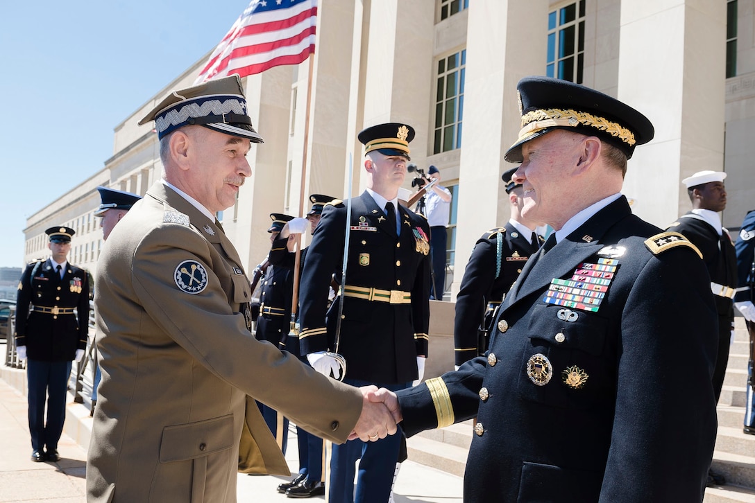 U.S. Army Gen. Martin E. Dempsey, right, chairman of the Joint Chiefs ...