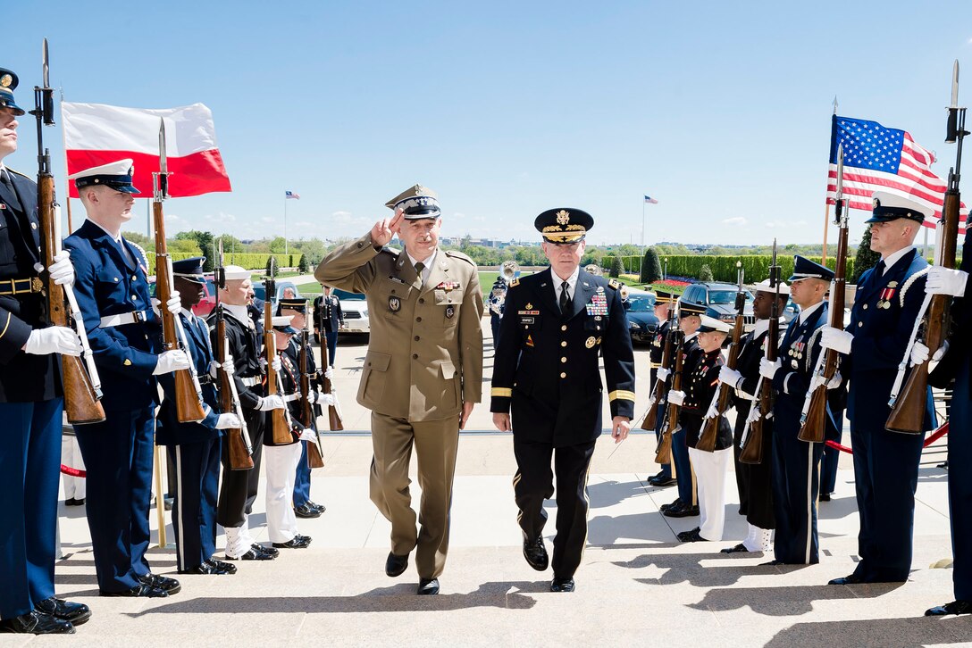 U.S. Army Gen. Martin E. Dempsey, right, chairman of the Joint Chiefs of Staff, welcomes Polish Army Gen. Mieczyslaw Gocul, chief of the general staff of Poland's armed forces, to the Pentagon April 28, 2015.