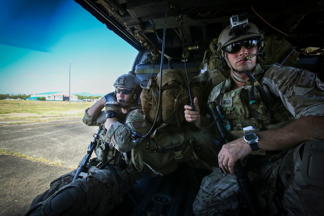 U.S. Air Force Staff Sgt. Dylan Crawford, left, and SSgt. Jason Jason Fischman, both pararescuemen with 31st Rescue Squadron, prepare for take off as they respond to a notional mass casualty incident during Exercise Balikatan 2015, in Clark Air Base, Philippines, April 24. The drill was conducted alongside rescuemen from the 505th Rescue and Search Group of the Philippine Air Force. The bilateral training event provided both rescue teams with a better understanding of how each other operates and ensures mission accomplishment should they work side-by-side in the future. Balikatan is an annual Philippines-U.S. military training exercise and humanitarian assistance engagement, which highlights the long standing partnership between both the nations.