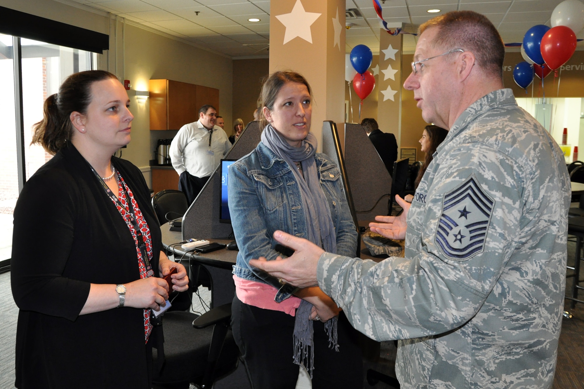 Tamara Hawes, Director of Community Relations, and Kelly Geers, District Director, both with the office of Representative Michael Turner of Ohio’s 10th District, talk with Air Force Reserve Chief Master Sgt. Steven Larwood, 910th Airlift Wing Command Chief, following a Congressional Flight, April 10, 2015. Staff personnel from the offices of four members of Ohio’s U.S. House of Representatives delegation and Ohio’s senior U.S. Senator participated in the flight which departed from and returned to here. According to Department of Defense (DoD) regulations, these flights are held in the best interest of DoD, Air Force (AF) and Air Force Reserve Command (AFRC) public affairs objectives and the invited congressional members or staffers can make positive contributions to the public's understanding of the roles and missions of the DoD, AF and AFRC. Click on the following link for more on the new USO Lounge at YARS: http://www.youngstown.afrc.af.mil/News/ArticleDisplay/tabid/822/Article/584806/910th-uso-cut-ribbon-on-new-yars-lounge.aspx  (U.S. Air Force photo/Master Sgt. Bob Barko Jr.)