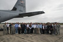 A group of 31 civic leaders and their military escorts, all participants in the 910th Airlift Wing’s Civic Leader Tour 2015 originating from Youngstown Air Reserve Station, Ohio, stand in front of a WC-130J aircraft on the flightline here, April 15, 2015. A walkthrough of the WC-130J, assigned to the 53rd Weather Reconnaissance Squadron Hurricane Hunters, was part of the itinerary of the two-day, one-night event, held April 15-16, 2015, designed to give attendees a better understanding of the Air Force Reserve mission and how it differs from base to base around the country. (U.S. Air Force photo/Master Sgt. Bob Barko Jr.)