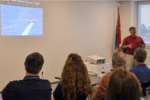 Kevin Carlisle, airport operations manager, briefs a group of 31 civic leaders and their military escorts, participants in the 910th Airlift Wing’s Civic Leader Tour 2015 originating from Youngstown Air Reserve Station, Ohio, April 16, 2015 here. Carlisle explained how the airport hosted 10,000 members of Joint Task Force Buckeye, led by the Ohio National Guard, in the aftermath of Hurricane Katrina in 2005. Five years later, the airport hosted an Air Force Reserve special mission, the 910th’s Department of Defense-unique Aerial Spray Mission and Oil Spill Dispersing capability in response to 2010’s Deepwater Horizon Oil Spill. The civic leaders and their military escorts visited Stennis as part of the two-day, one-night event, designed to give attendees a better understanding of the Air Force Reserve mission and how it differs from base to base around the country. U.S. Air Force photo by Master Sgt. Bob Barko Jr.