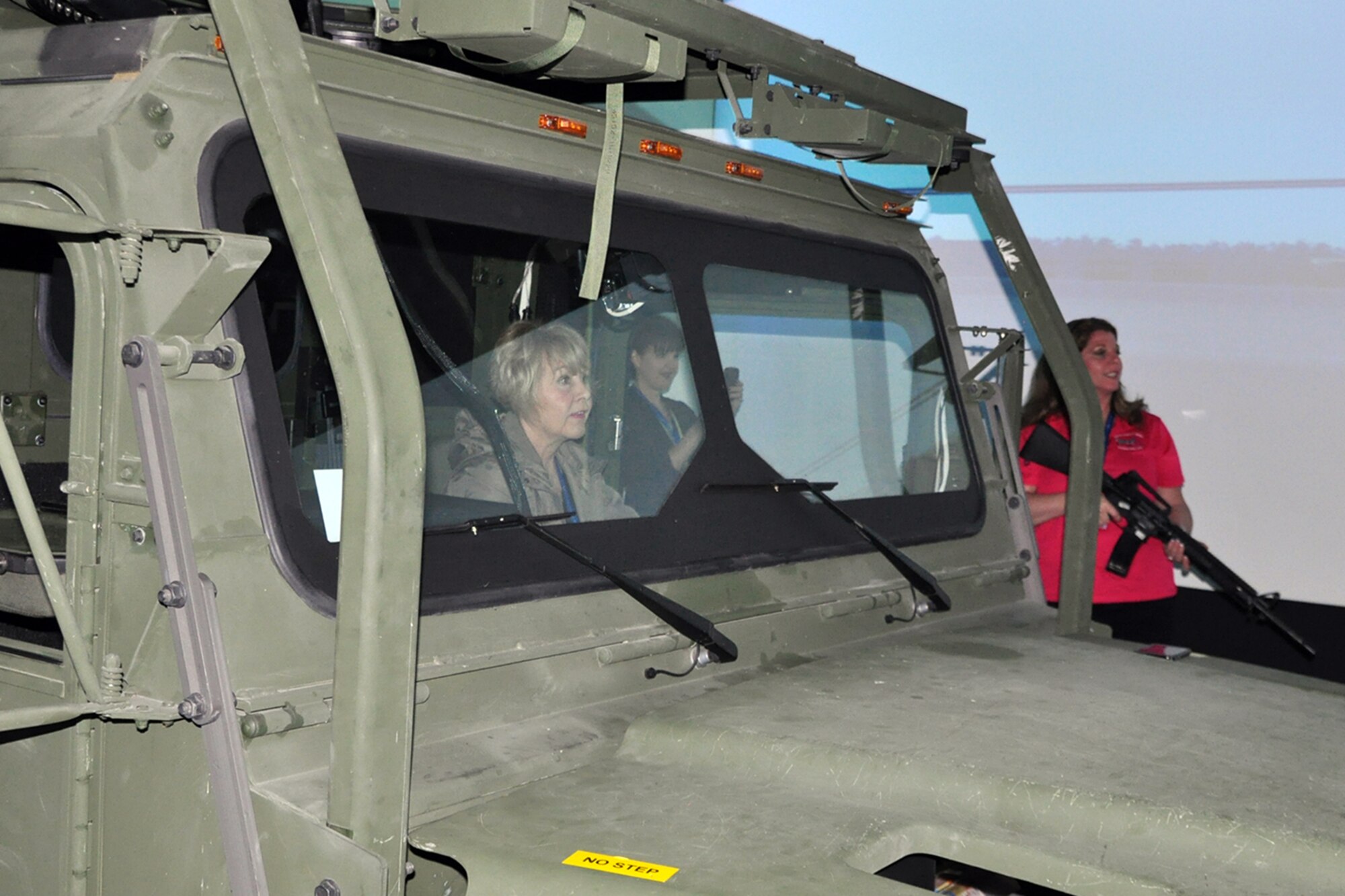 A team of civic leaders prepare for action in a combat convoy simulator during their visit to the Naval Construction Battalion Center Gulfport, the training center for the U.S. Navy’s famed SeaBees, located  here, April 16, 2015. The civic leaders were all participants in the 910th Airlift Wing’s Civic Leader Tour 2015 originating from Youngstown Air Reserve Station, Ohio. The visit to the Navy installation, which allowed the Ohio civic leaders to see operations of a sister service and the joint interaction between services including meeting an Air Force instructor at the SeaBee school house, was part of the itinerary of the two-day, one-night event, held April 15-16, 2015, designed to give attendees a better understanding of the Air Force Reserve mission and how it differs from base to base around the country. (U.S. Air Force photo/Master Sgt. Bob Barko Jr.)