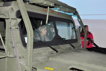 A team of civic leaders prepare for action in a combat convoy simulator during their visit to the Naval Construction Battalion Center Gulfport, the training center for the U.S. Navy’s famed SeaBees, located  here, April 16, 2015. The civic leaders were all participants in the 910th Airlift Wing’s Civic Leader Tour 2015 originating from Youngstown Air Reserve Station, Ohio. The visit to the Navy installation, which allowed the Ohio civic leaders to see operations of a sister service and the joint interaction between services including meeting an Air Force instructor at the SeaBee school house, was part of the itinerary of the two-day, one-night event, held April 15-16, 2015, designed to give attendees a better understanding of the Air Force Reserve mission and how it differs from base to base around the country. (U.S. Air Force photo/Master Sgt. Bob Barko Jr.)