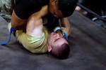 In bout 8 of the heavyweight division, Staff Sgt. Lonnie Kincaid of Fort Riley defeated 2nd Lt. Ivan Iotchkolovsky of the Illinois National Guard on the third and final day of competition at the MACP All Army Championship Tournament at Smith Gym on Fort Benning, Ga., Oct. 3, 2010.