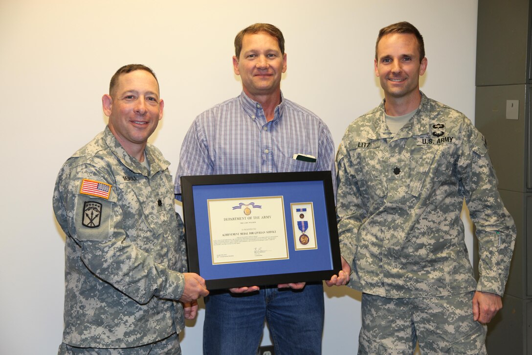 Gary Wilder of the Charleston District's Construction and Survey Annex Resident Office was awarded an achievement medal by one of our customers for his superior effort on the job.