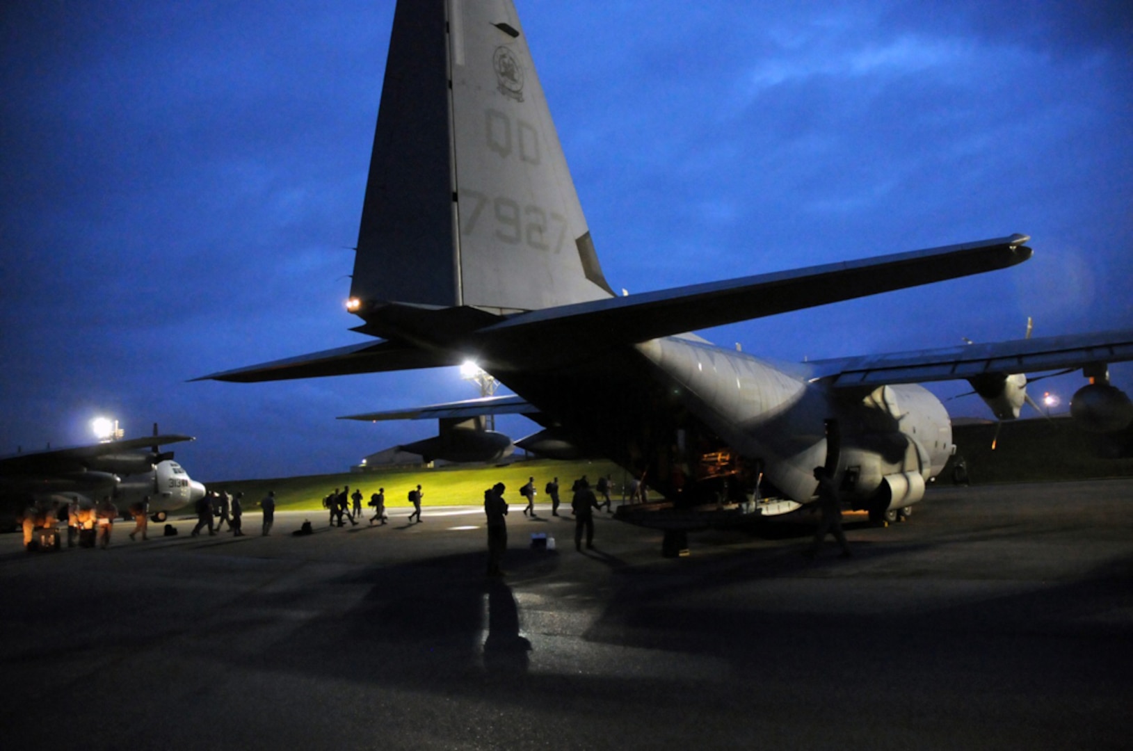 KADENA AIR BASE, Japan (Apr, 29, 2015) - Members of a U.S. Pacific Command Joint Humanitarian Assistance Survey Team load onto a U.S. Marine Corps C-130. The team is deploying to Nepal to assist earthquake relief efforts. Kadena’s Airmen worked through the night to load the team’s 20-plus members and gear for the departure. 