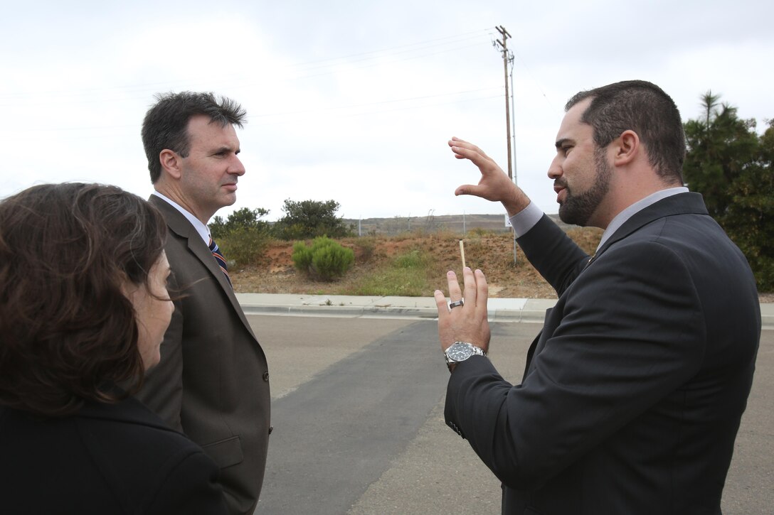 Joseph Bryan, Deputy Assistant Secretary of the Navy, Energy , speaks with Mick Wasco, Marine Corps Air Station Miramar Energy Manager, while viewing the the landfill gas facility aboard Marine Corps Air Station Miramar, California April 24. The visit included a presentation about the station's energy capabilities and goals. (U.S. Marine Corps photo by Sgt. Lillian Stephens/Released)