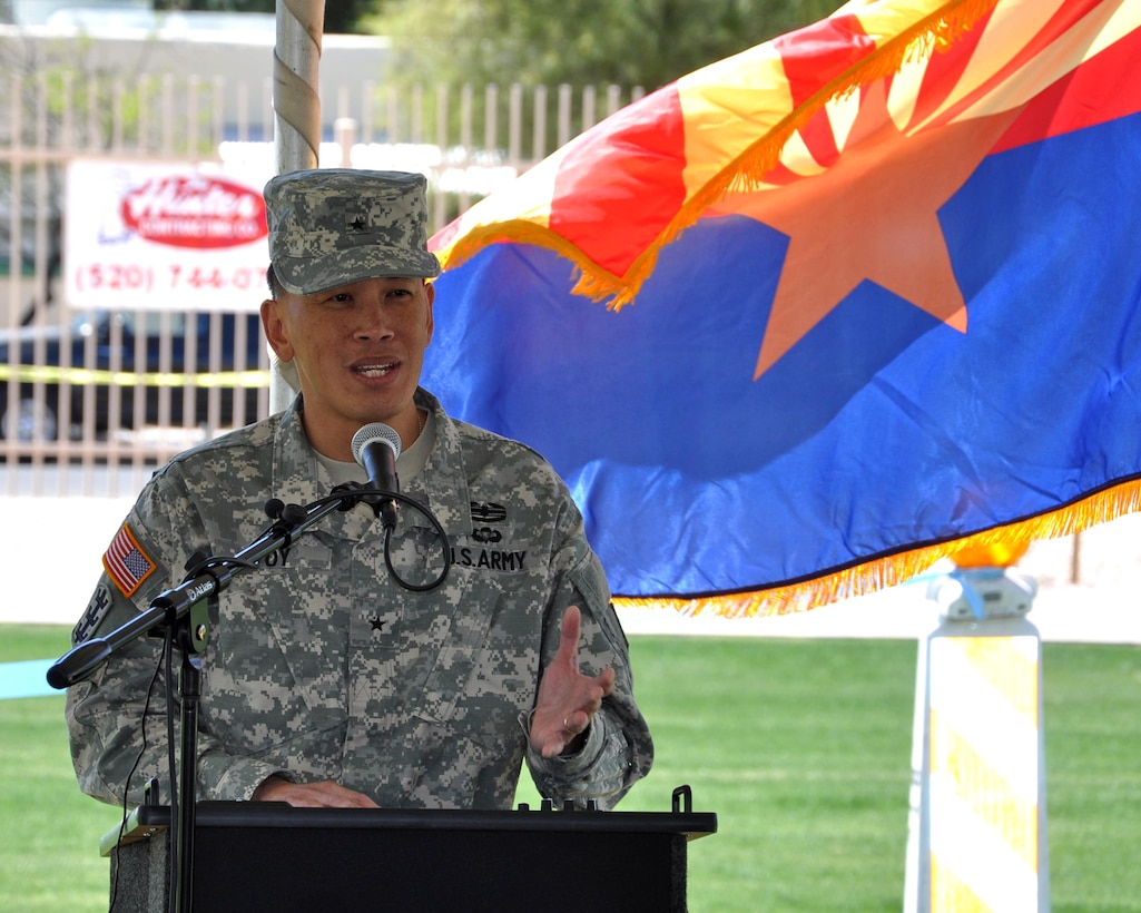 Brig. Gen. Mark Toy, U.S. Army Corps of Engineers South Pacific Division commander, addresses the audience at a ceremony marking the completion of the final phase of the Tucson Drainage Area/Arroyo Chico Multi-use Project at Tucson High School April 16. The $5 million segment was completed in 11 months and will greatly reduce flood risk for more than 1,000 residential, commercial and industrial structures with an assessed value of over $300 million.