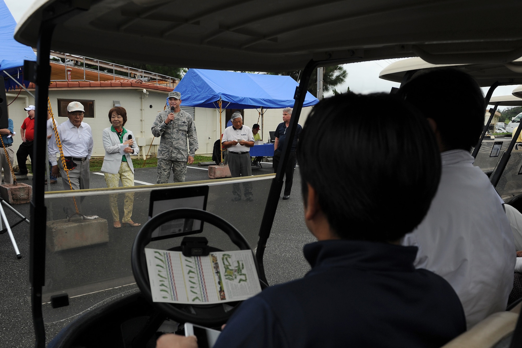 U.S. Air Force Brig. Gen. Barry R. Cornish, 18th Wing commander, welcomes participants to the Kadena Special Olympics golf tournament fundraiser on Kadena Air Base, Japan, April 29, 2015. More than 160 local nationals came on base to participate in the golf tournament, which is held annually to raise awareness and money for KSO in November. (U.S. Air Force photo by Airman 1st Class Zade C. Vadnais)