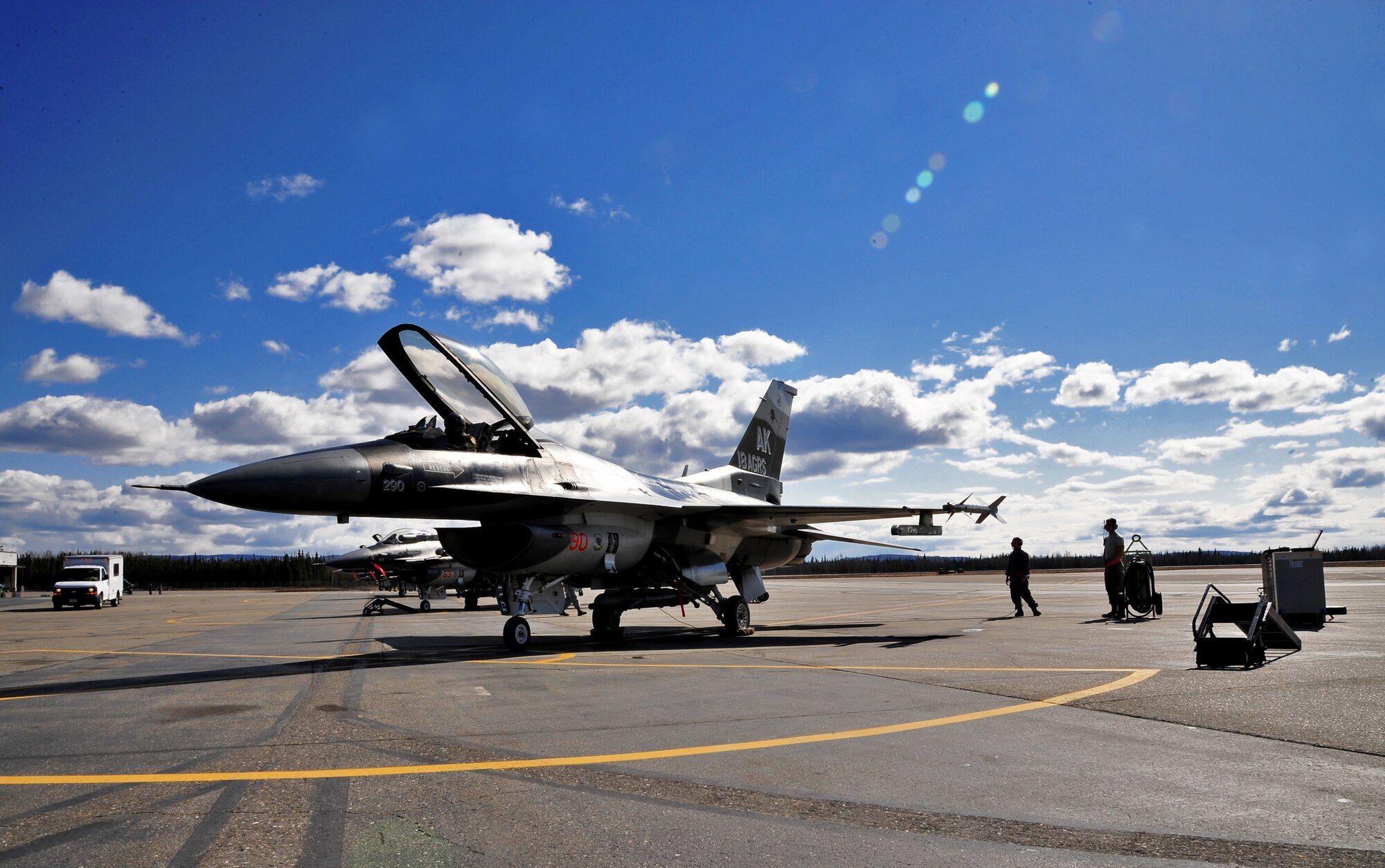 An F-16 Fighting Falcon assigned to the 18th Aggressor Squadron waits to taxi for take-off during Distant Frontier at Eielson Air Force Base, Alaska, April 28, 2015.  Aggressor pilots are trained to act as opposing forces in RED FLAG-Alaska to prepare U.S. and allied forces for real-world aerial combat. (U.S. Air Force photo by Tech. Sgt. Miguel Lara III/Released)