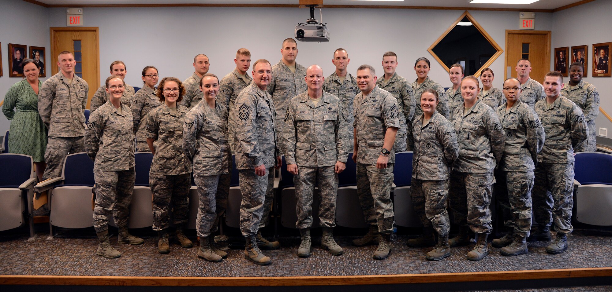Airmen from the recent Resiliency Tiger Team pose with, left to right, Command Chief Master Sgts. Marty Anderson, 8th Air Force; Terry West, Air Force Global Strike Command and Tommy Mazzone, 2nd Bomb Wing, on Barksdale Air Force Base, La., April 1, 2015. Around 20 Airmen were selected from AFGSC, numbered air forces and wings to voice ideas on combatting real life issues with realistic resiliency techniques. (U.S. Air Force photo/Senior Airman Joseph A. Pagán Jr.)