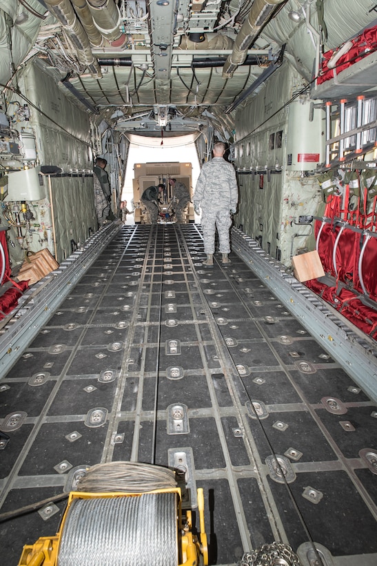 Airmen load TRN-48 TACAN for upcoming training