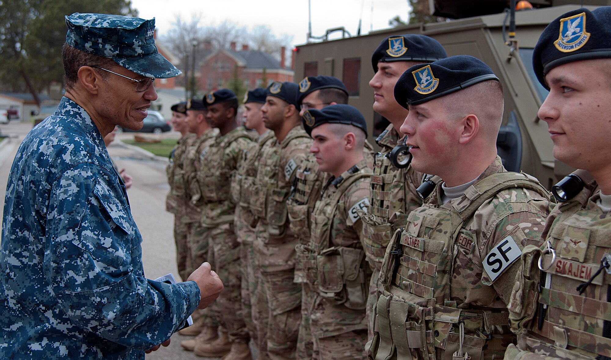 U.S. Navy Adm. Cecil D. Haney, U.S. Strategic Command commander, talks with 790th Missile Security Forces Squadron convoy response force members during a visit to F.E. Warren Air Force Base, Wyo., April 28, 2015. Haney traveled to F.E. Warren to see firsthand the men and women performing the ICBM mission 24/7, 365, and to chair the Intercontinental Ballistic Missile Stakeholders meeting, one of several such meetings that will be held this year. USSTRATCOM is one of nine DoD unified combatant commands and is charged with strategic deterrence; space operations; cyberspace operations; joint electronic warfare; global strike; missile defense; intelligence, surveillance and reconnaissance; combating weapons of mass destruction; and analysis and targeting. (U.S. Air Force photo by Airman 1st Class Brandon Valle)