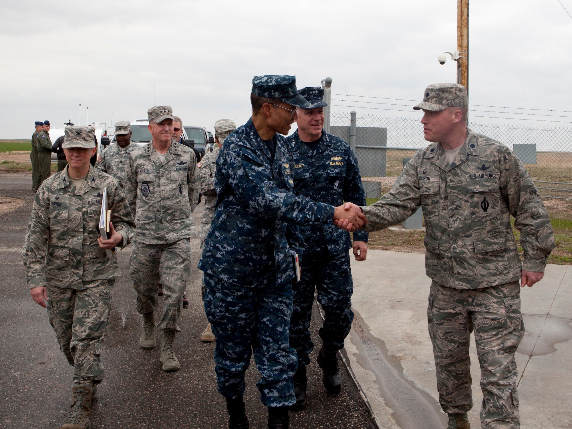 U.S. Navy Adm. Cecil D. Haney, U.S. Strategic Command commander, greets U.S. Air Force Col. Jeremy Olson, 319th Missile Squadron commander, at a missile alert facility in Nebraska, as part of his visit to F.E. Warren Air Force Base, Wyo., April 27, 2015. Haney traveled to F.E. Warren to see firsthand the men and women performing the ICBM mission 24/7, 365, and to chair the Intercontinental Ballistic Missile Stakeholders meeting, one of several such meetings that will be held this year. USSTRATCOM is one of nine DoD unified combatant commands and is charged with strategic deterrence; space operations; cyberspace operations; joint electronic warfare; global strike; missile defense; intelligence, surveillance and reconnaissance; combating weapons of mass destruction; and analysis and targeting. (U.S. Air Force photo by Lan Kim)