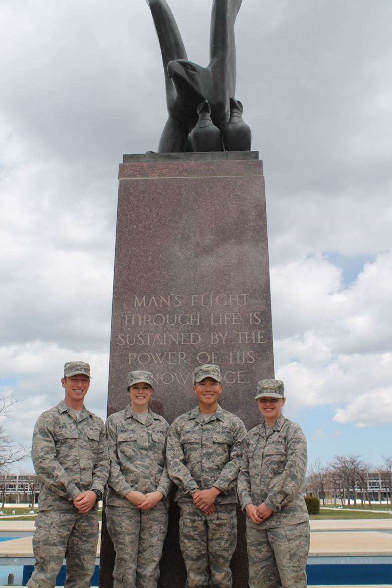Left to right: Cadets 3rd Class Eric Albers and Krista Kelly stand with Cadets 2nd Class Bryan Park and Ashley Olson on the terrazzo at the U.S. Air Force Academy. The cadets are teaming with local students and partnering with the El Pomar Foundation, a local nonprofit organization that funds the El Pomar scholars program. The cadets are the Academy's 2015 El Pomar scholars. (U.S. Air Force photo)

