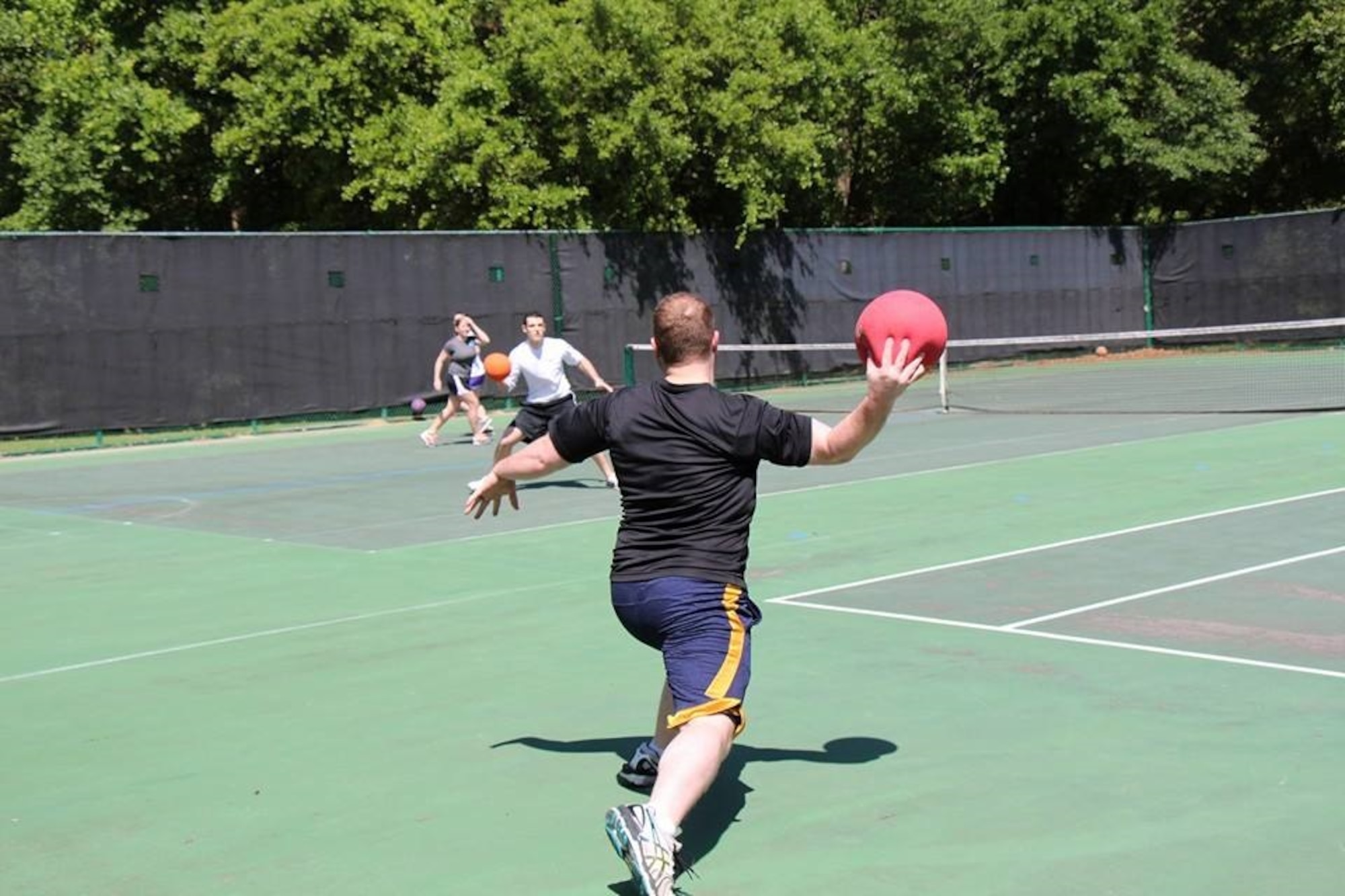 Service members participate in the second annual Dodgeball Tournament April 24, 2015 at Joint Base Charleston - Weapons Station, S.C. SPAWAR Systems Center Atlantic hosted the tournament to help raise awareness for Sexual Assault Awareness and Prevention Month.  The winning team "Crew Bravo" from Nuclear Power Training Unit Charleston beat out team "Code 11/51" from SPAWAR. (Courtesy photo) 

