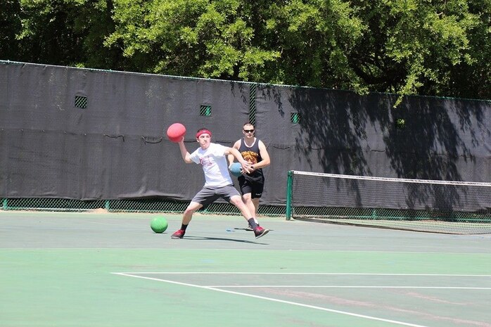Service members participate in the second annual Dodgeball Tournament April 24, 2015 at Joint Base Charleston - Weapons Station, S.C. SPAWAR Systems Center Atlantic hosted the tournament to help raise awareness for Sexual Assault Awareness and Prevention Month.  The winning team "Crew Bravo" from Nuclear Power Training Unit Charleston beat out team "Code 11/51" from SPAWAR. (Courtesy photo) 

