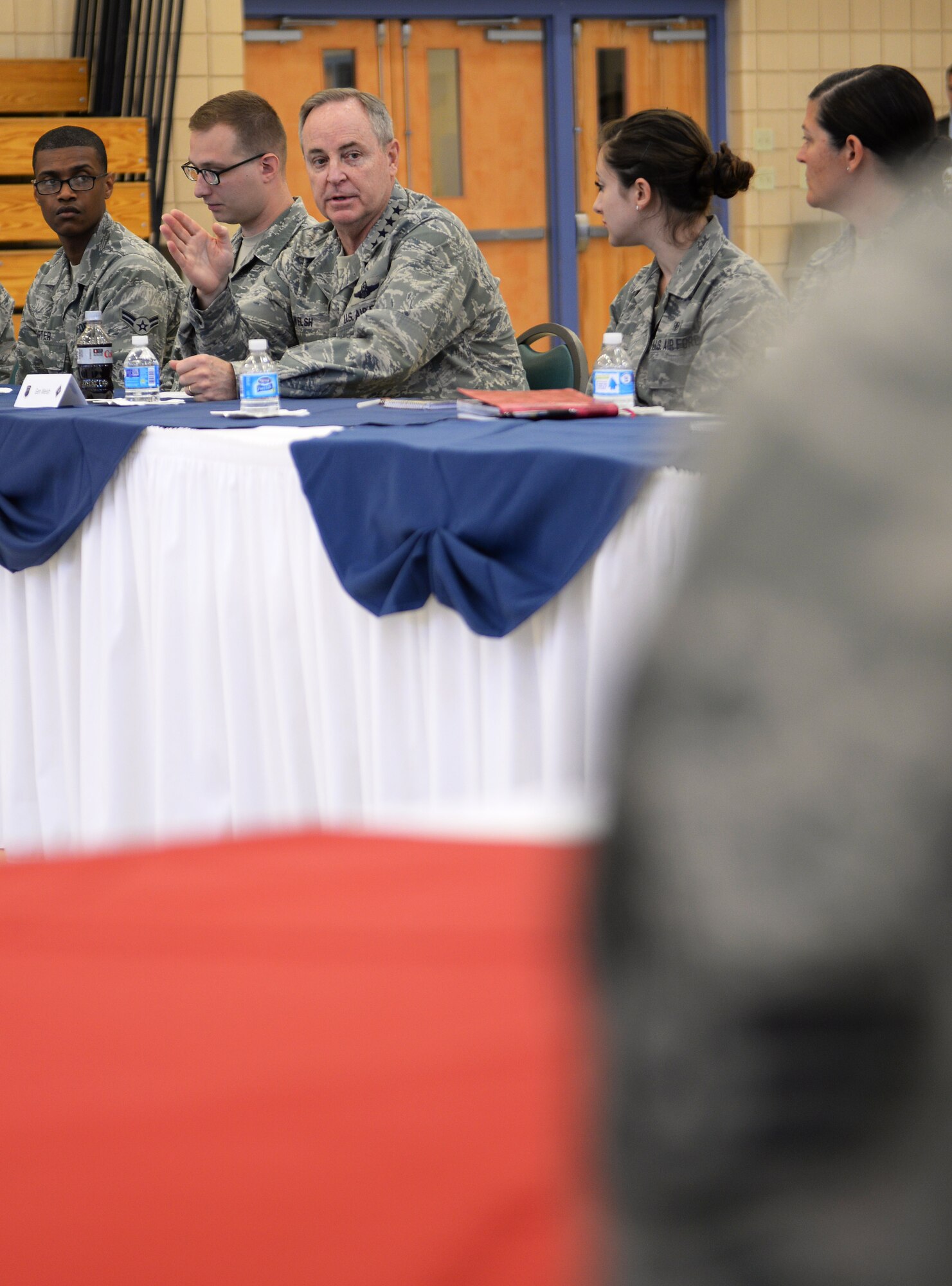 Chief of Staff of the U.S. Air Force, Gen. Mark A. Welsh III, answers questions from Airmen during a roundtable conversation at Langley Air Force Base, Va., April 29, 2015. During his visit, Welsh discussed topics with Airmen such as force reduction, training requirements and readiness. (U.S. Air Force photo by Staff Sgt. Teresa J. Cleveland/Released)
