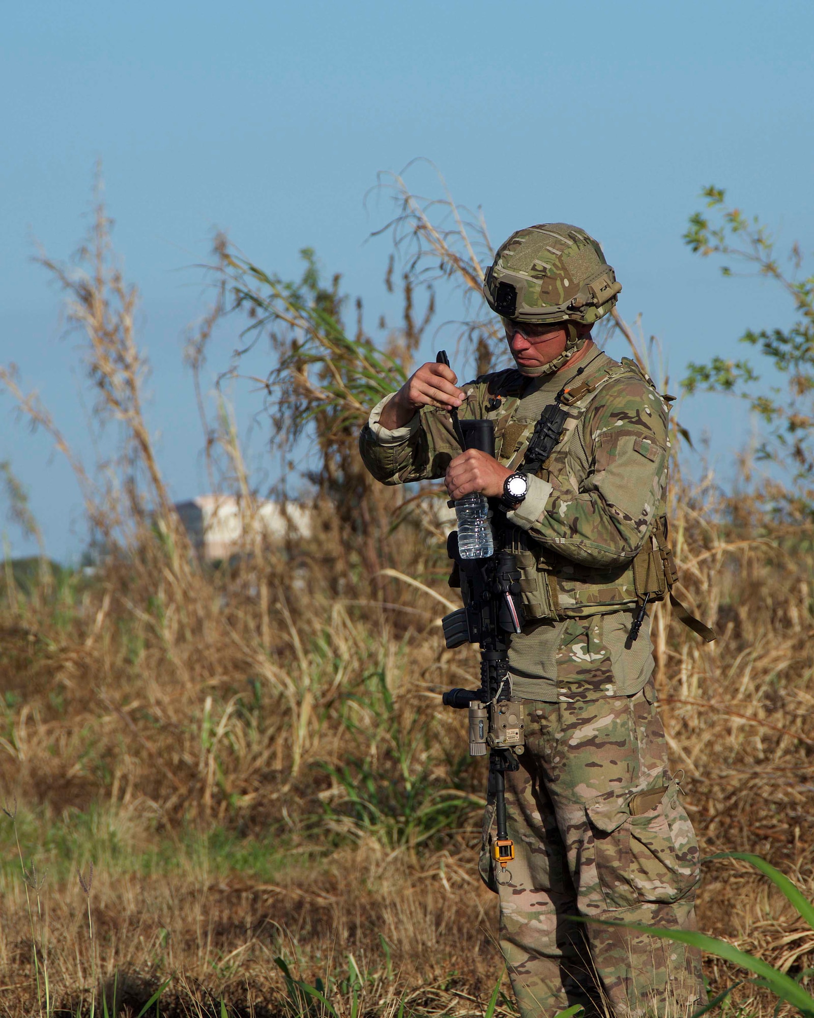 Tech. Sgt. Aaron Johns, team leader for the 482nd Civil Engineering Squadron Explosive Ordnance Disposal Flight, prepares a water charge at Homestead Air Reserve Base, Fla., April 7. The water charge was used to disable an improvised explosive device during a weeklong dismounted counter-IED training exercise aimed to prepare the reservists for combat operations. (U.S. Air Force photo by Staff Sgt. Jaimi L. Upthegrove)