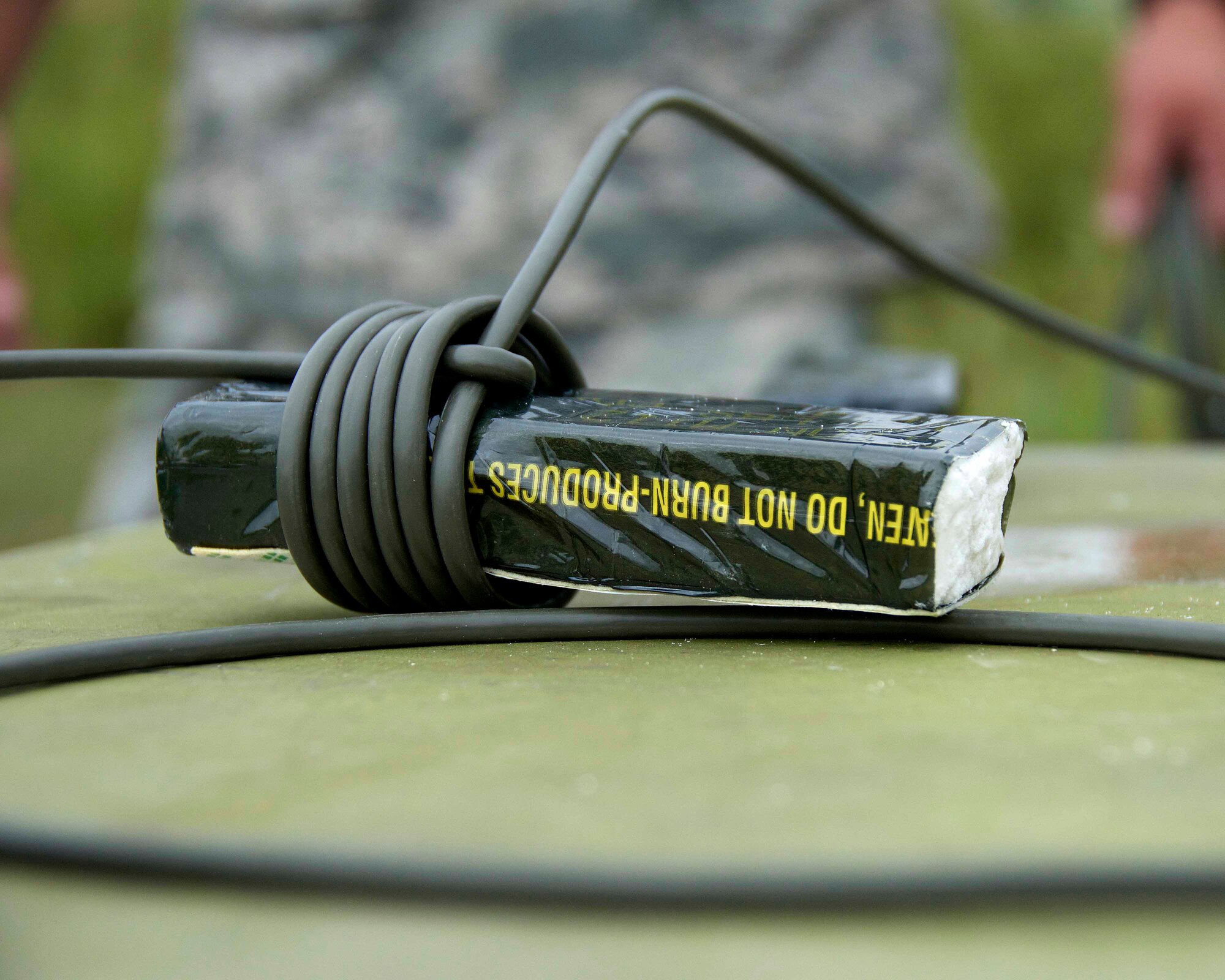 A block of C-4 wrapped in detonating cord is used by the 482nd Civil Engineering Squadron Explosive Ordnance Disposal Flight to simulate a controlled detonation of a hazardous device at Homestead Air Reserve Base, Fla., March 25. The EOD Flight is required to conduct this type of training on a regular basis to keep their skills sharp. (U.S. Air Force photo by Staff Sgt. Jaimi L. Upthegrove)